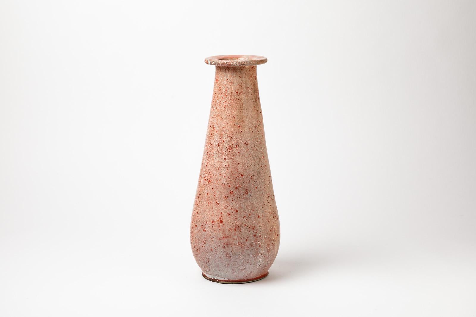 Attributed to Jacques Lenoble

Elegant ceramic vase with pink ceramic glaze color.

Beautiful handmade form typical from the 1930s.

Signed J under the base.

Dimensions: 34 x 13 x 13cm.