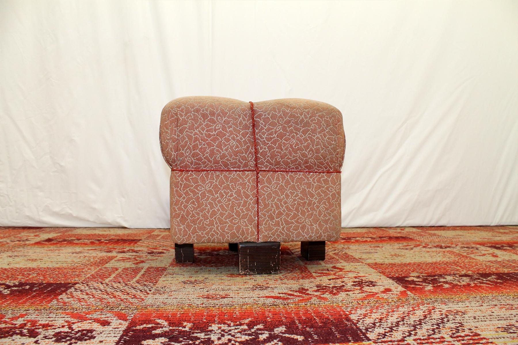 This pouffe (footstool) was designed by Jindrich Halabala and produced by UP Závody in the 1950s. Very comfortable retro chic. The upholstery and the wood showing significant signs of age and using. But the pouffe is stable.