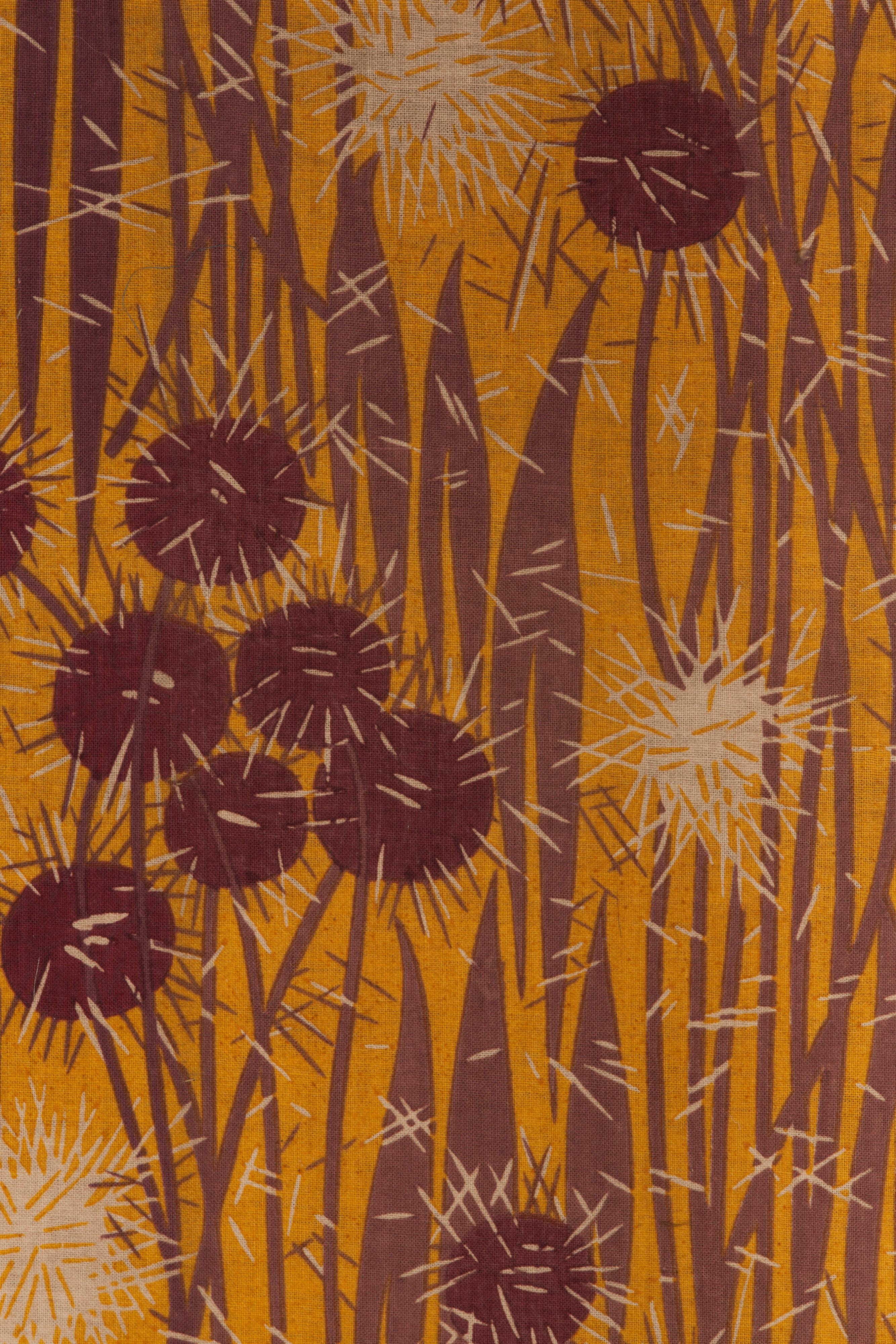 This pelmut for window or headboard features a typical art deco style of just 3 flat, high-contrast colors in a hand-screened printed thistle pattern. The curvelinear lower half is edged in short fringe.