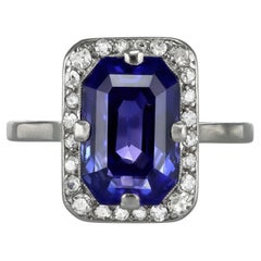 Art Deco purple sapphire and diamond cluster ring, circa 1920.