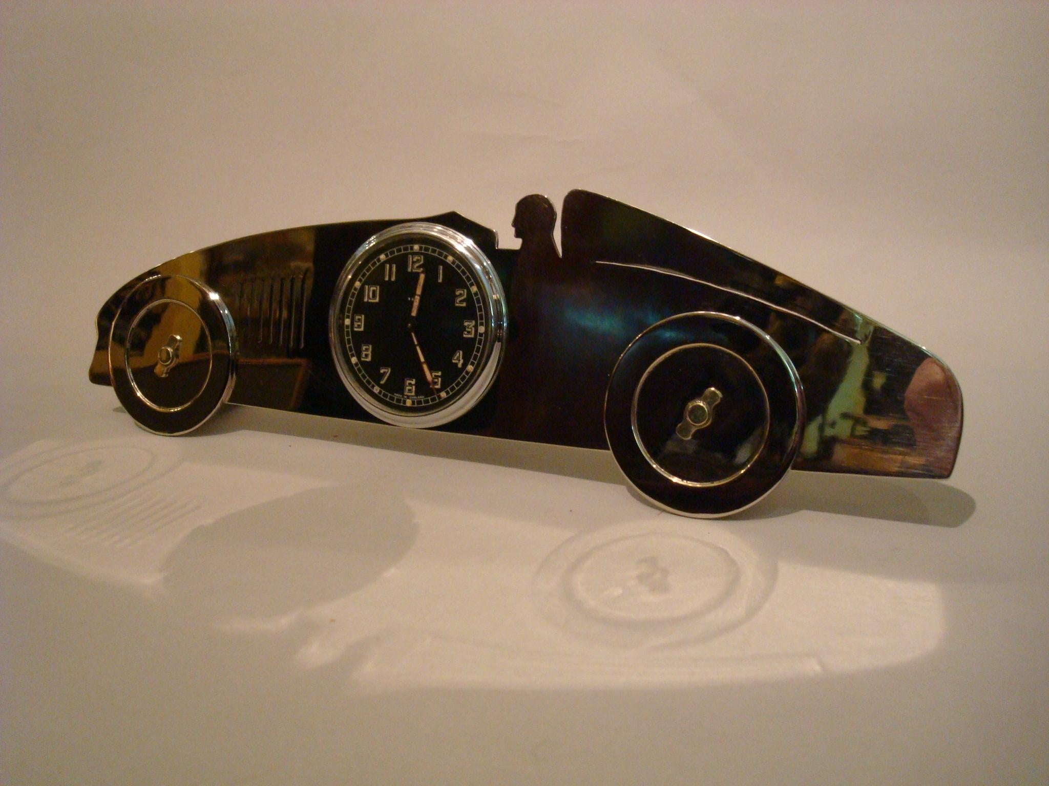 Art Deco racing car desk clock. Looks like an indianapolis racing car.
Ítem has just been restored, it working perfectly.
Perfect gift for any collector of Automobilia / Car Mascot / Hood Ornament.
Made in the U.K. 1920s.