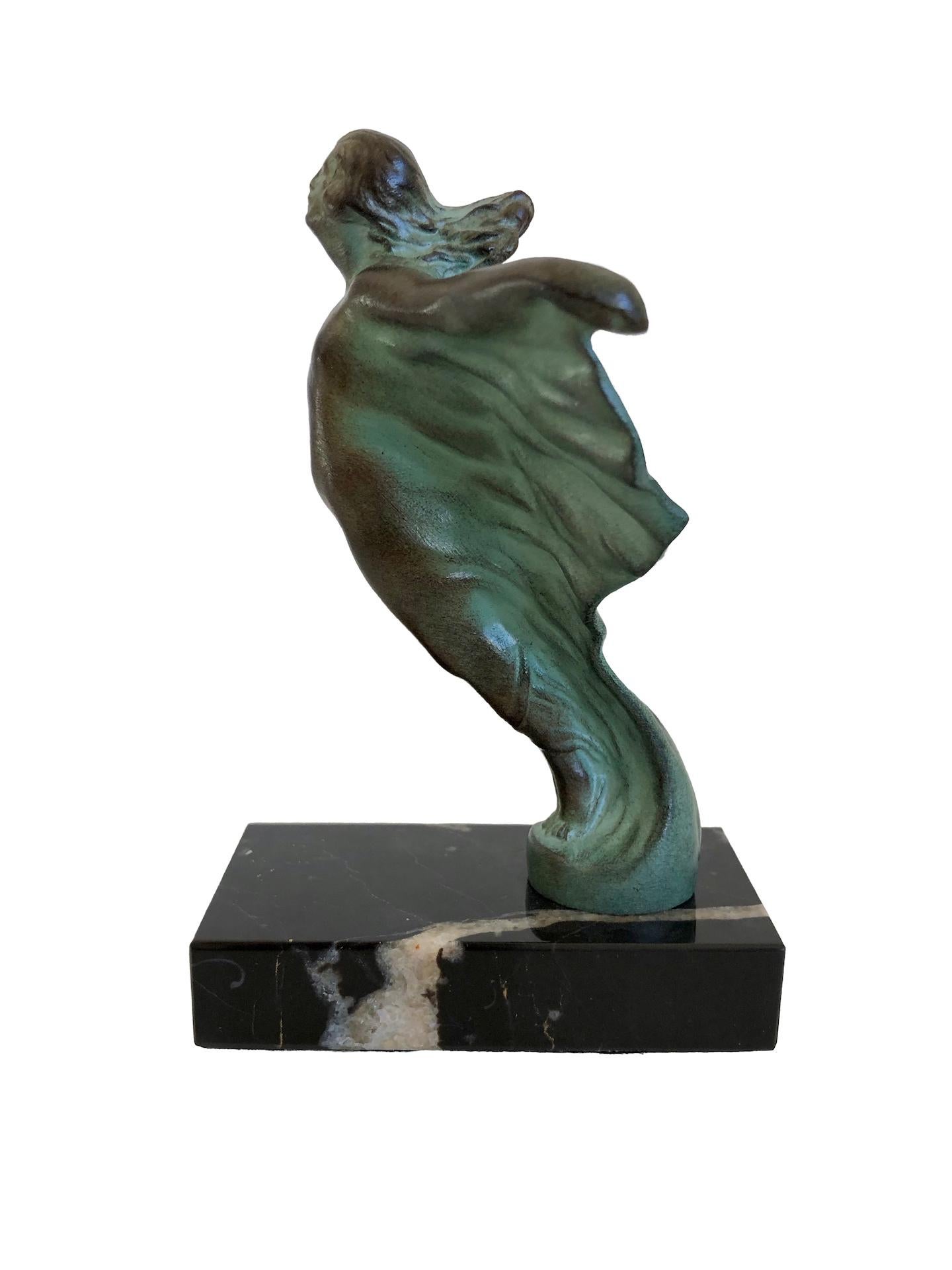 Very decorative hood ornament named EOLA 
This Radiator Mascot is not only for collectors. 
Designed in France during the roaring 1920s by “Max Le Verrier” himself 
The EOLA is one of his first sculptures, inspired by the famous EMILY from Rolls