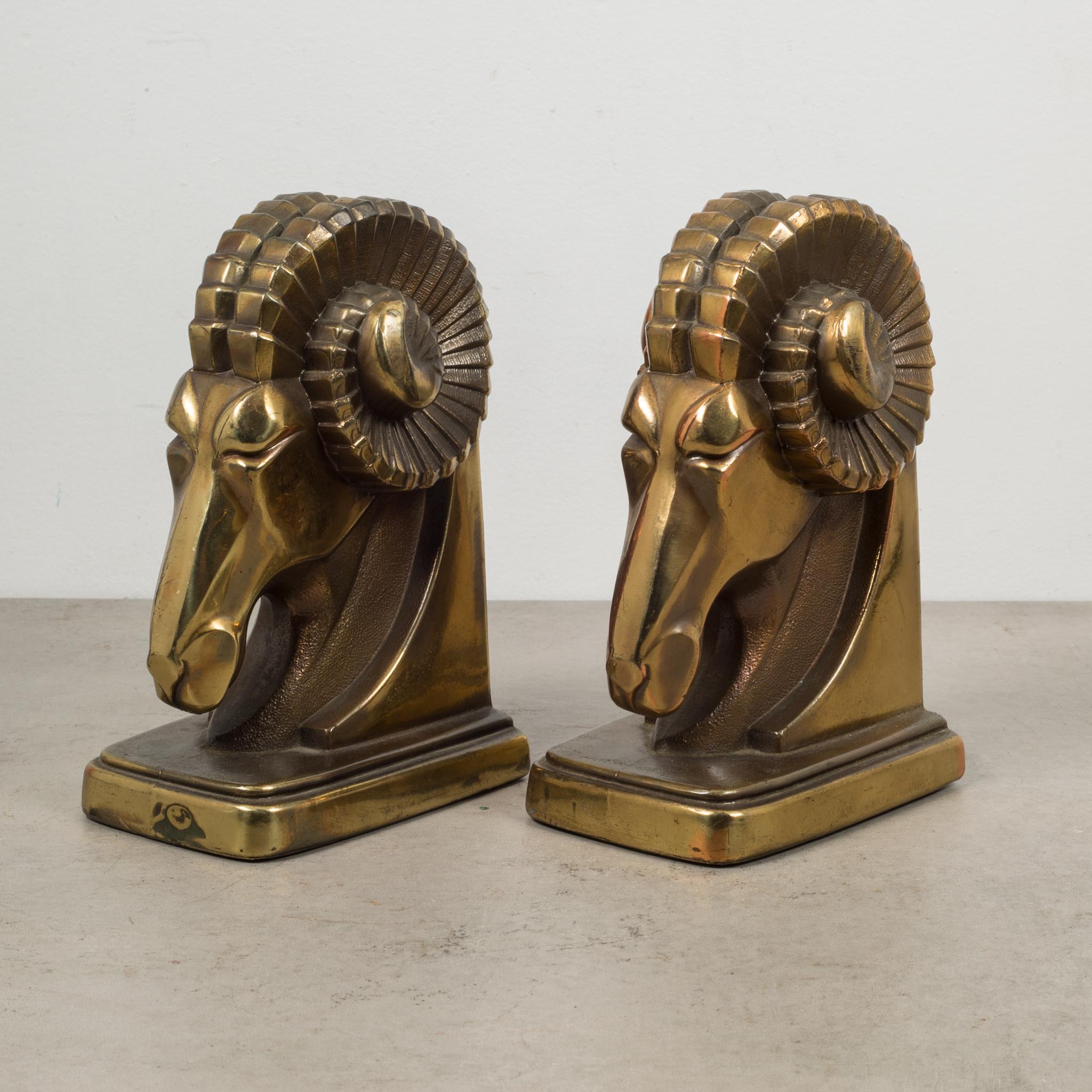 About:

A pair of brass-plated Art Deco stylized ram bookends. One bookends retain the original felt bottom.

Creator: Unknown.
Date of manufacture: circa 1930.
Materials and techniques: Brass plate over pot metal.
Condition: Good. Wear