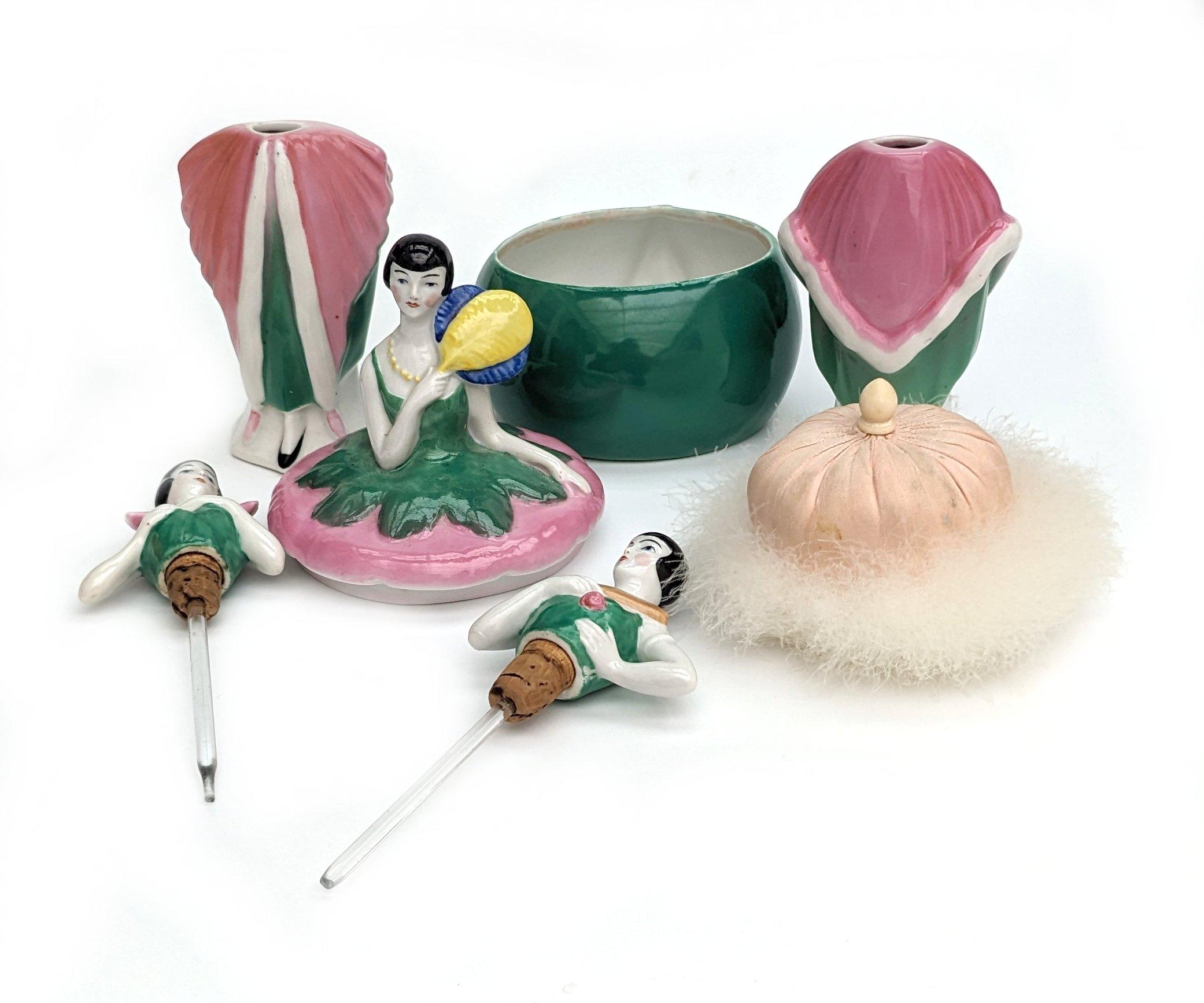 First time we've had one of these so quite a rare find and in superb condition is this wonderful 1930's Art Deco German half doll related ladies perfume vanity set . Two perfume bottles with glass daubers in tact. Powder jar with original powder