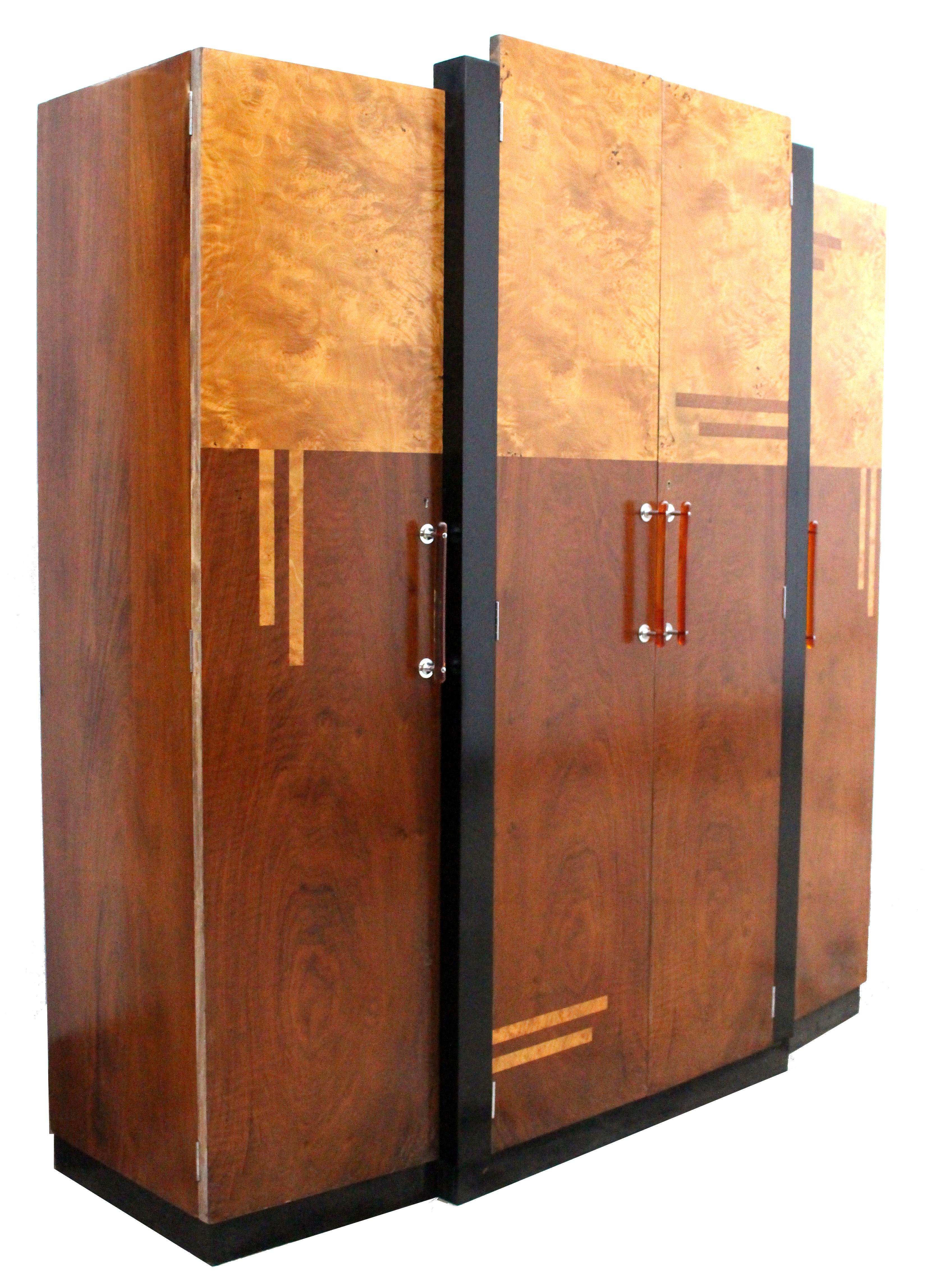 Rarely does the opportunity come along to acquire a truly iconically designed piece that represents it's era so well as this superb Art Deco three door triple wardrobe. Dating to the 1930's the quality throughout this piece is of the highest spec