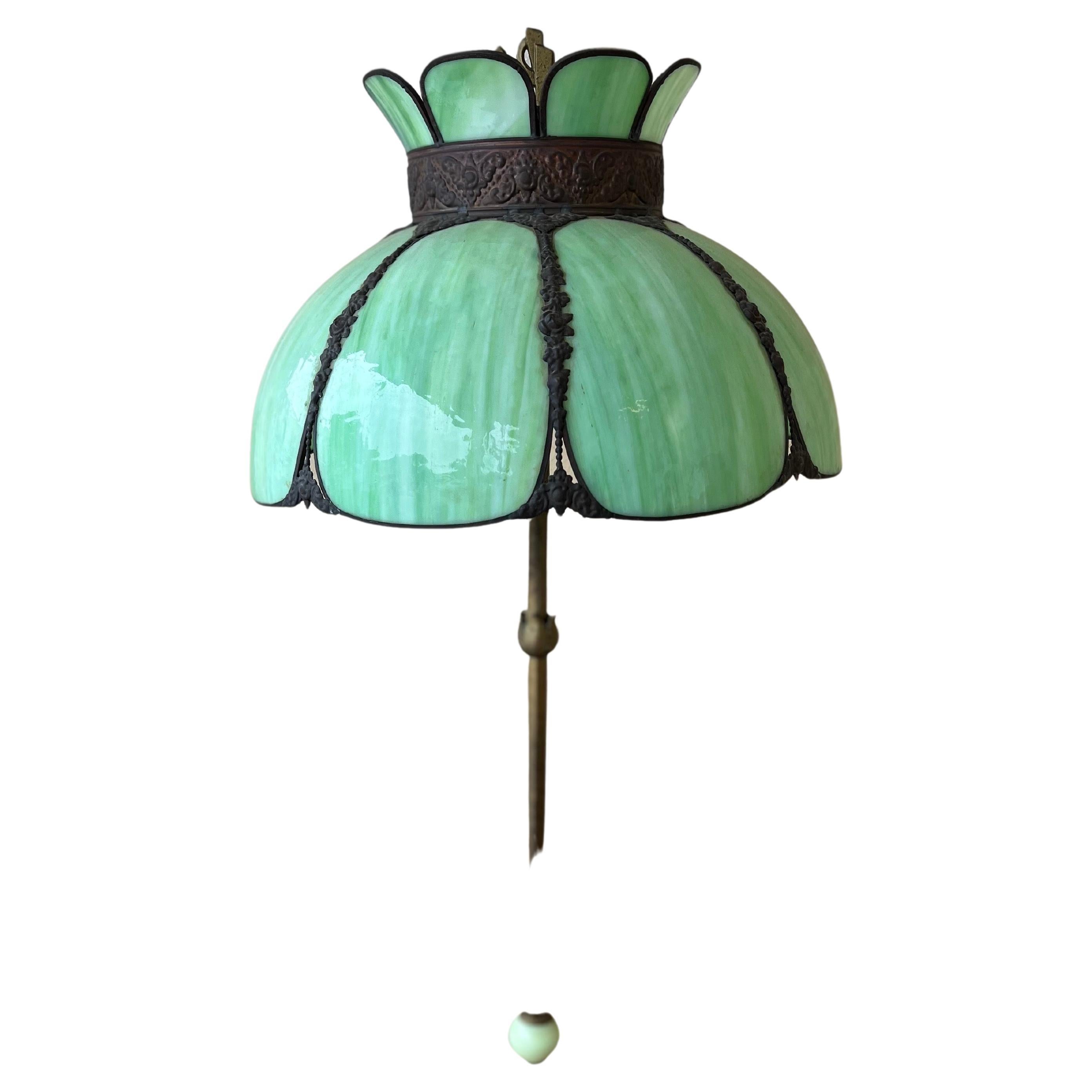 A beautiful rare art Deco floor lamp freshly rewired, original stained jadeite glass, new gold cloth cord, painted metal base with guild accents, circa the 1920s, 


