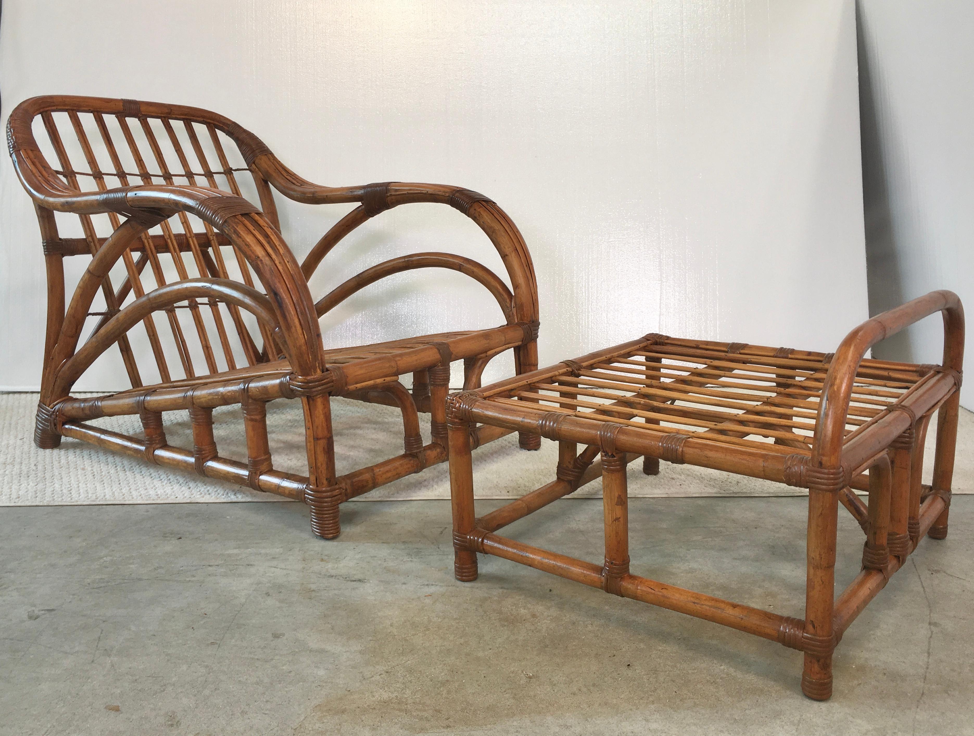 Sleek, streamlined and generously proportioned 1940s Art Deco rattan roadster lounge chair and ottoman. Big chair for a big man. Note how beautifully the three tubular strands of the arms flow sinuously into the arched back of the chair. Solid,