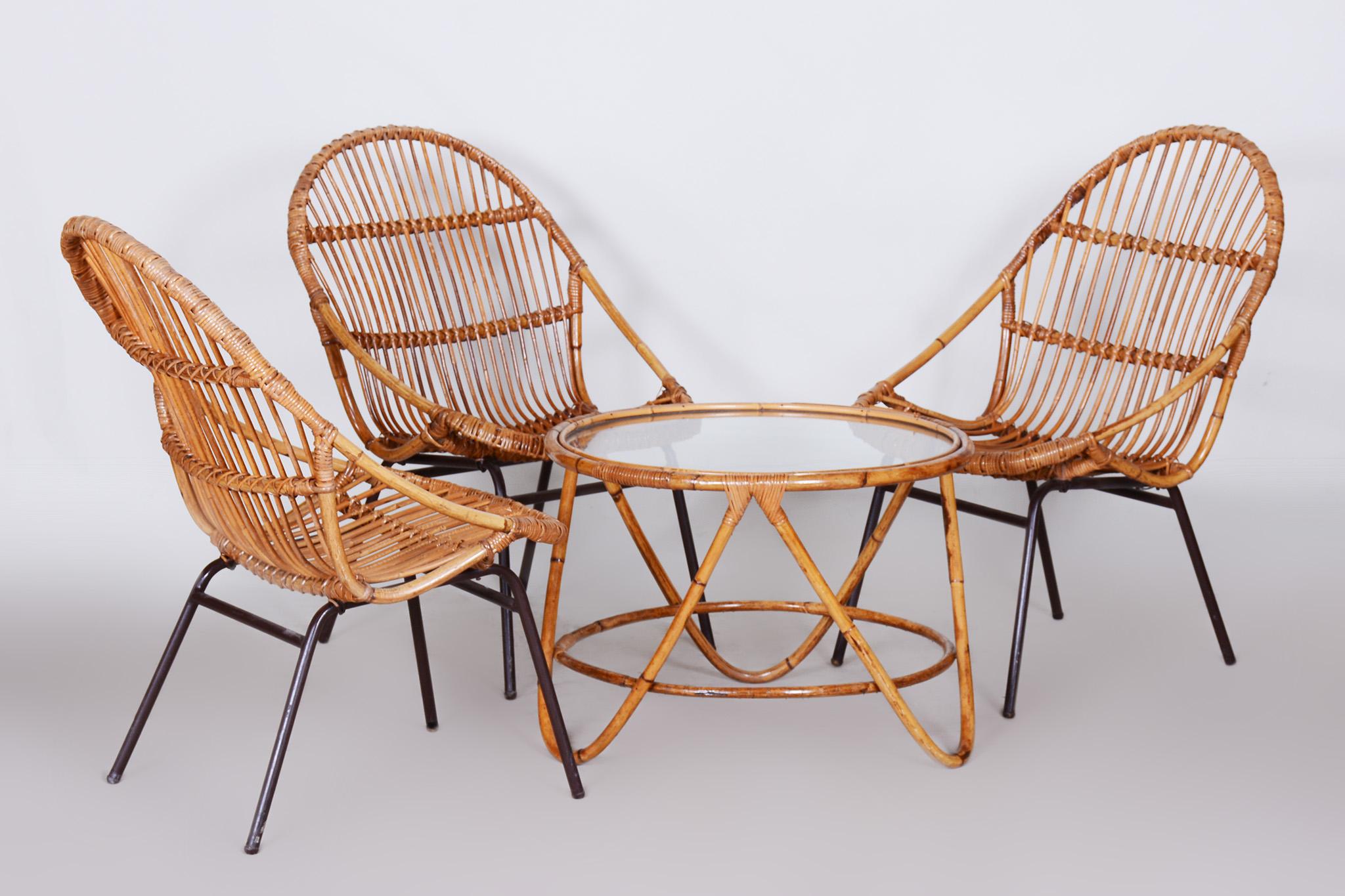 Art Deco Rattan seating set designed by Alna Fuchs.

Set of three chairs and a small table.
Perfect original condition.

Period: 1940-1949
Material: Rattan, glass, tubular steel
Source: Czechia

Chair dimensions:
height: 85 cm (33.5