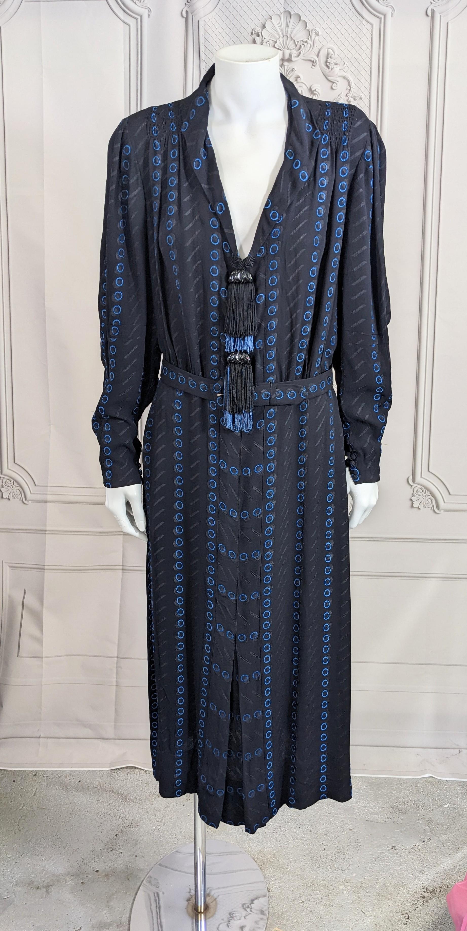 Art Deco Rayon Day Dress, Retailed by Moore's Honolulu. Wonderful rayon Art Deco Jacquard textile with incredible hand carved bakelite and tonal blue and black silk tassels. 
Wonderful detailing on this 1930's dress. Ruched gathers on shoulders,