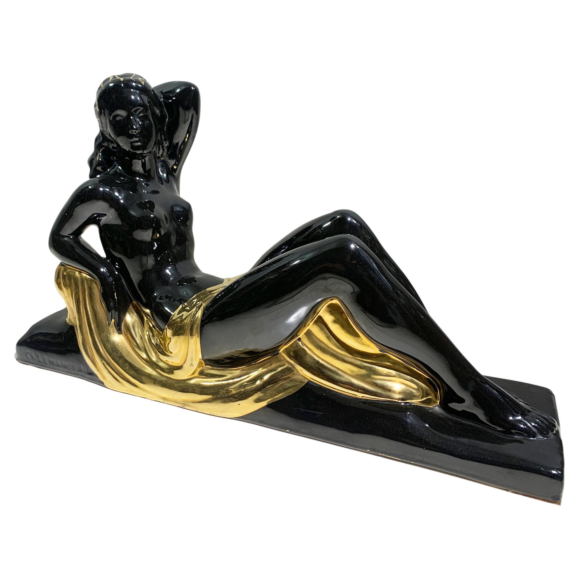 Escultura Art Déco "Mujer reclinada" de Charles Lemanceau, firmada "C.Lemanceau" en venta