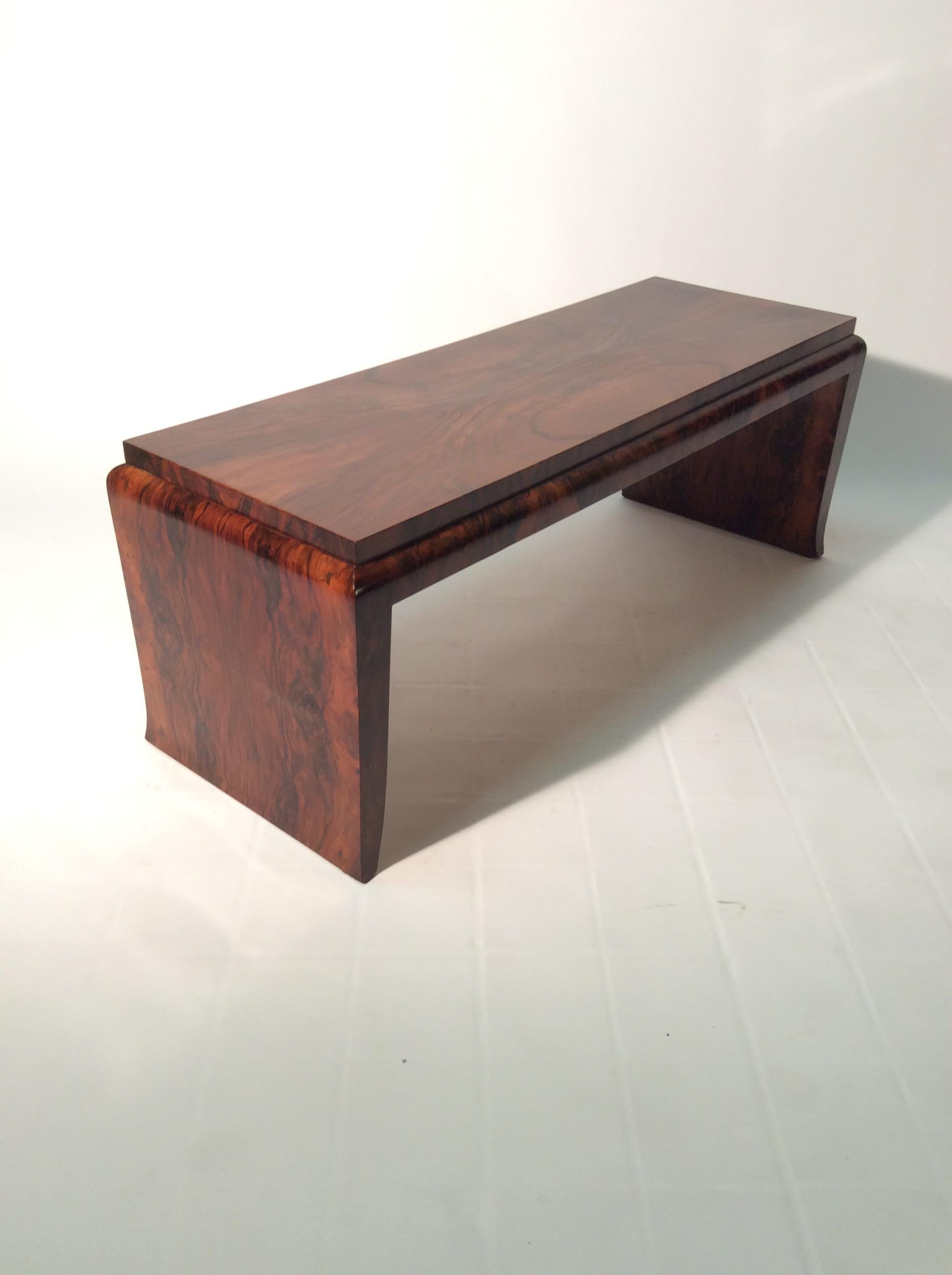 Coffee table Sofa table or rectangular bench thanks to the elongated shape it can be used in front of the sofa, made in Italy in the 1930s Art Deco period with beautiful warm color walnut briar, this table is characterized by its stilysh proportion