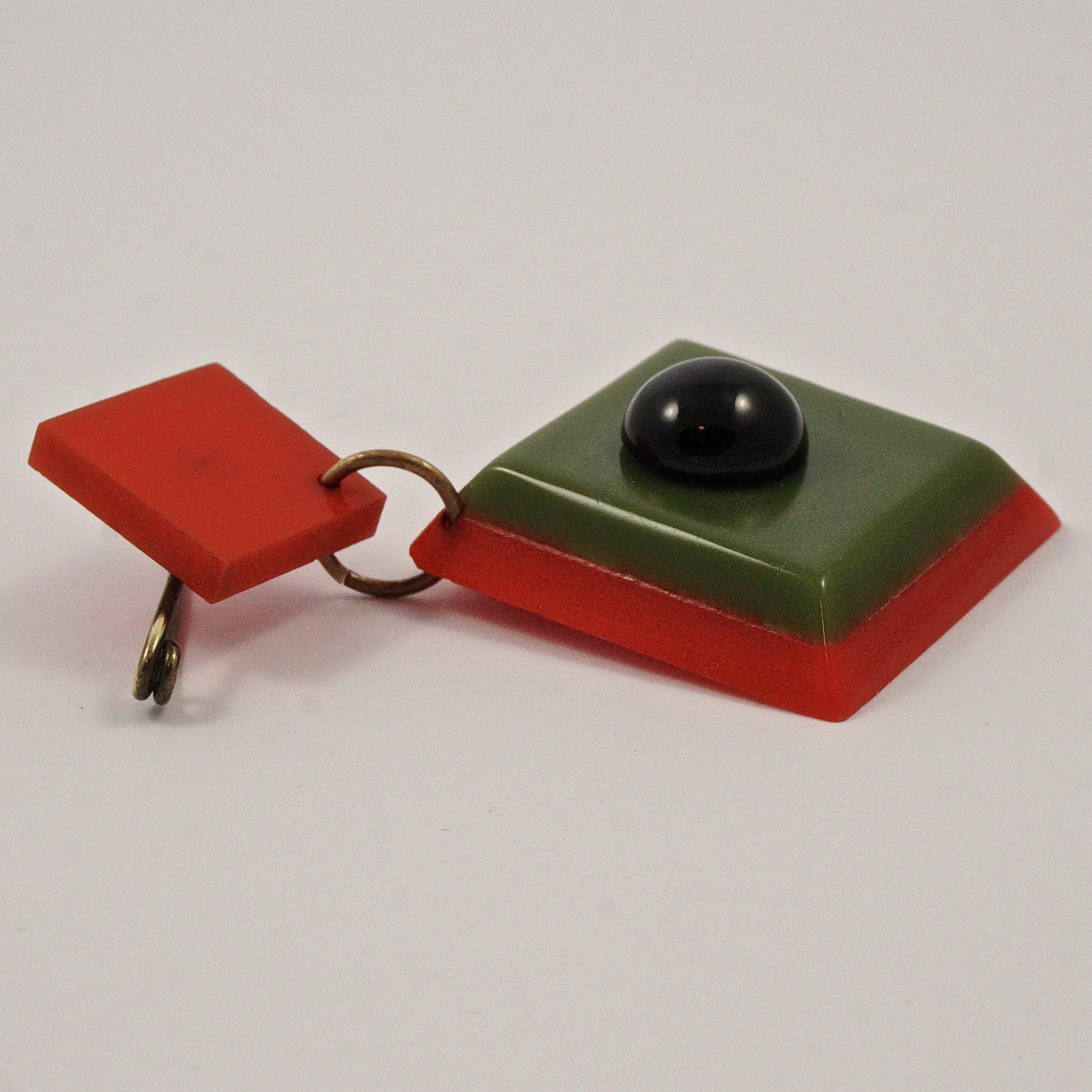 Art Deco Red and Green Early Plastic and Black Glass Geometric Brooch In Good Condition For Sale In London, GB