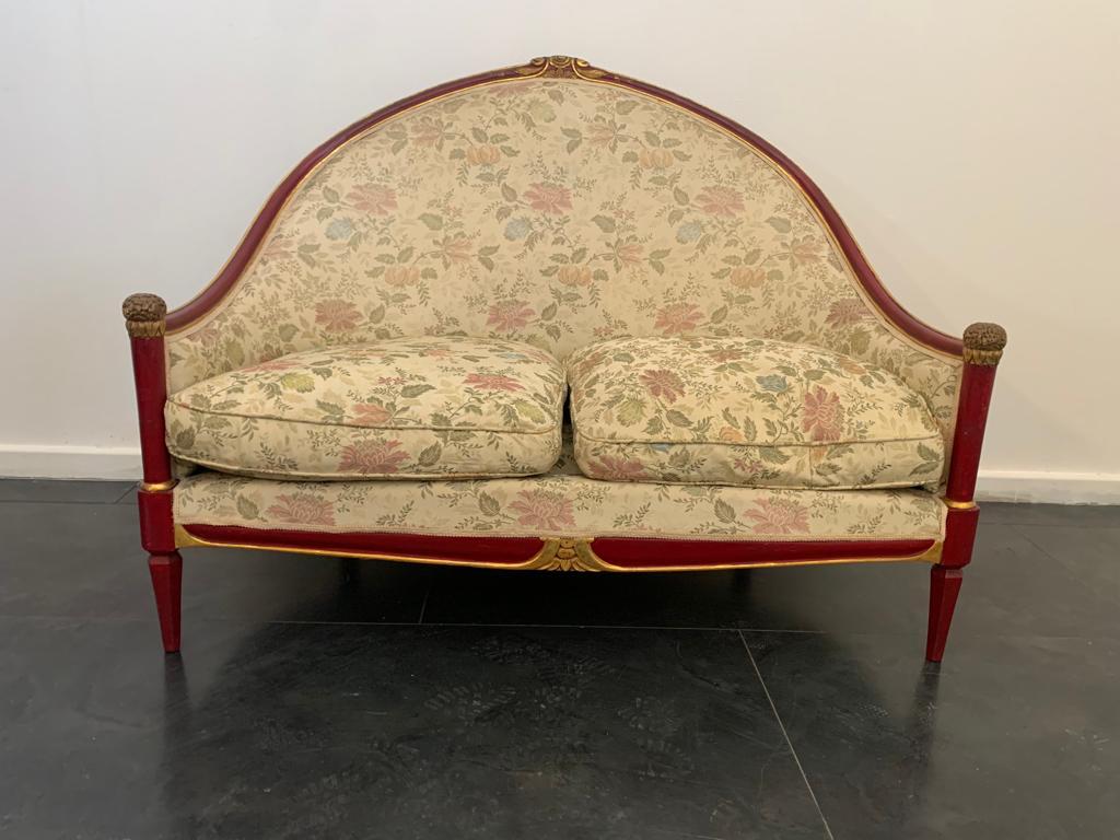 Cardinal red lacquered Art Deco sofa with finely carved knobs and gold leaf appliqués. Upholstery in generously thick jacquard fabric, worked with fine threads and gold, in excellent condition. Seat height - 40 cm.
Packaging with bubble wrap and