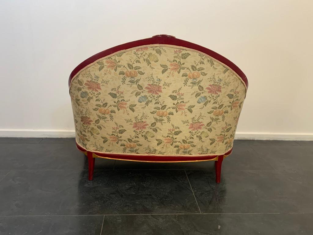 Early 20th Century Art Deco red lacquered sofa with carved details, 1930s For Sale