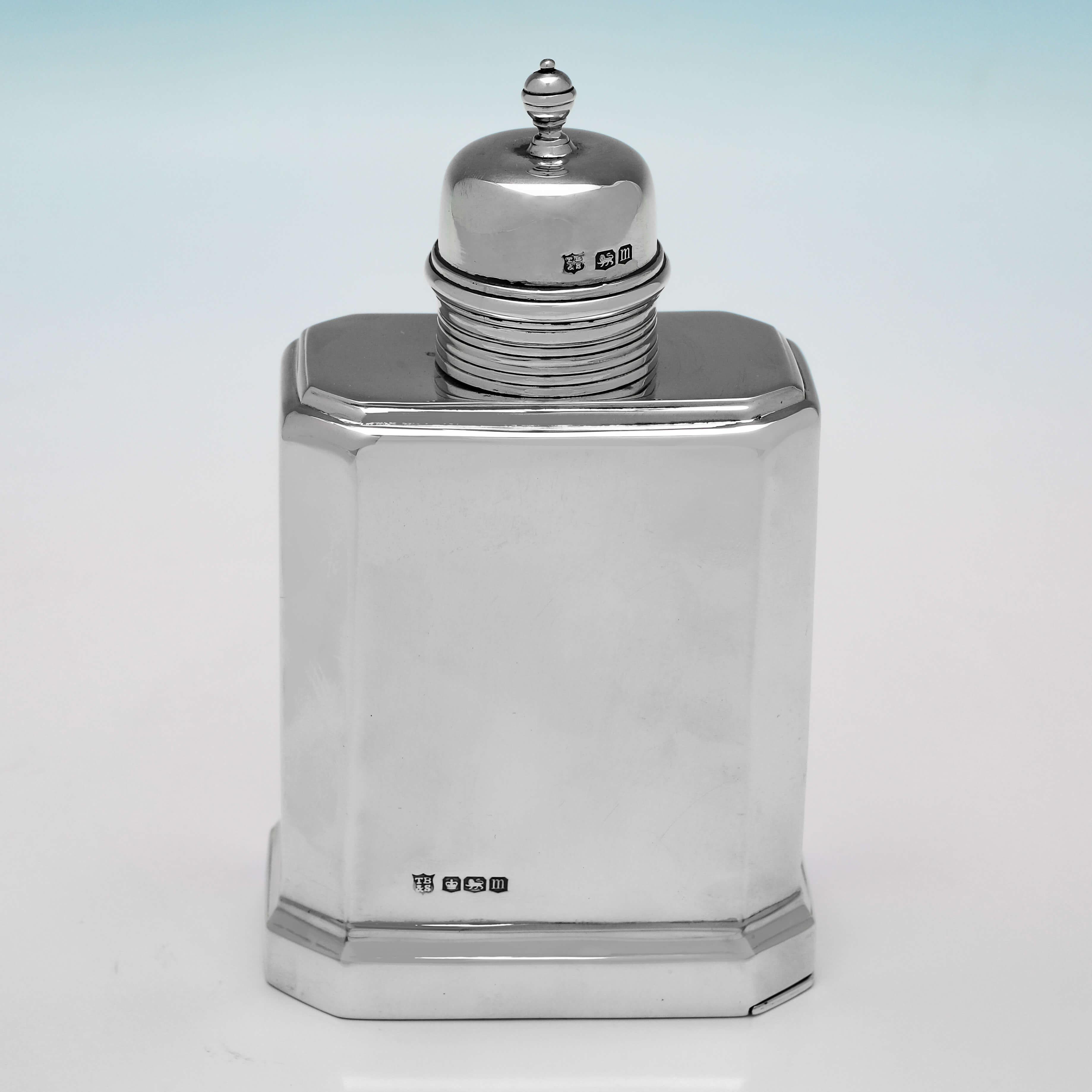 Hallmarked in Sheffield in 1929 by Thomas Bradbury & Sons, this handsome, Sterling Silver Tea Caddy, is a fine reproduction of a Queen Anne period caddy, with a slide off base, and removable cap. 

The tea caddy measures 5.25