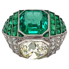 Art Deco Reproduction Platinum Old Mine Cut Diamond and Emerald Ring