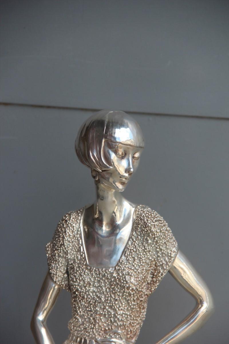 Art Deco resin sculpture with Italy 1970 silver foil woman with fan.