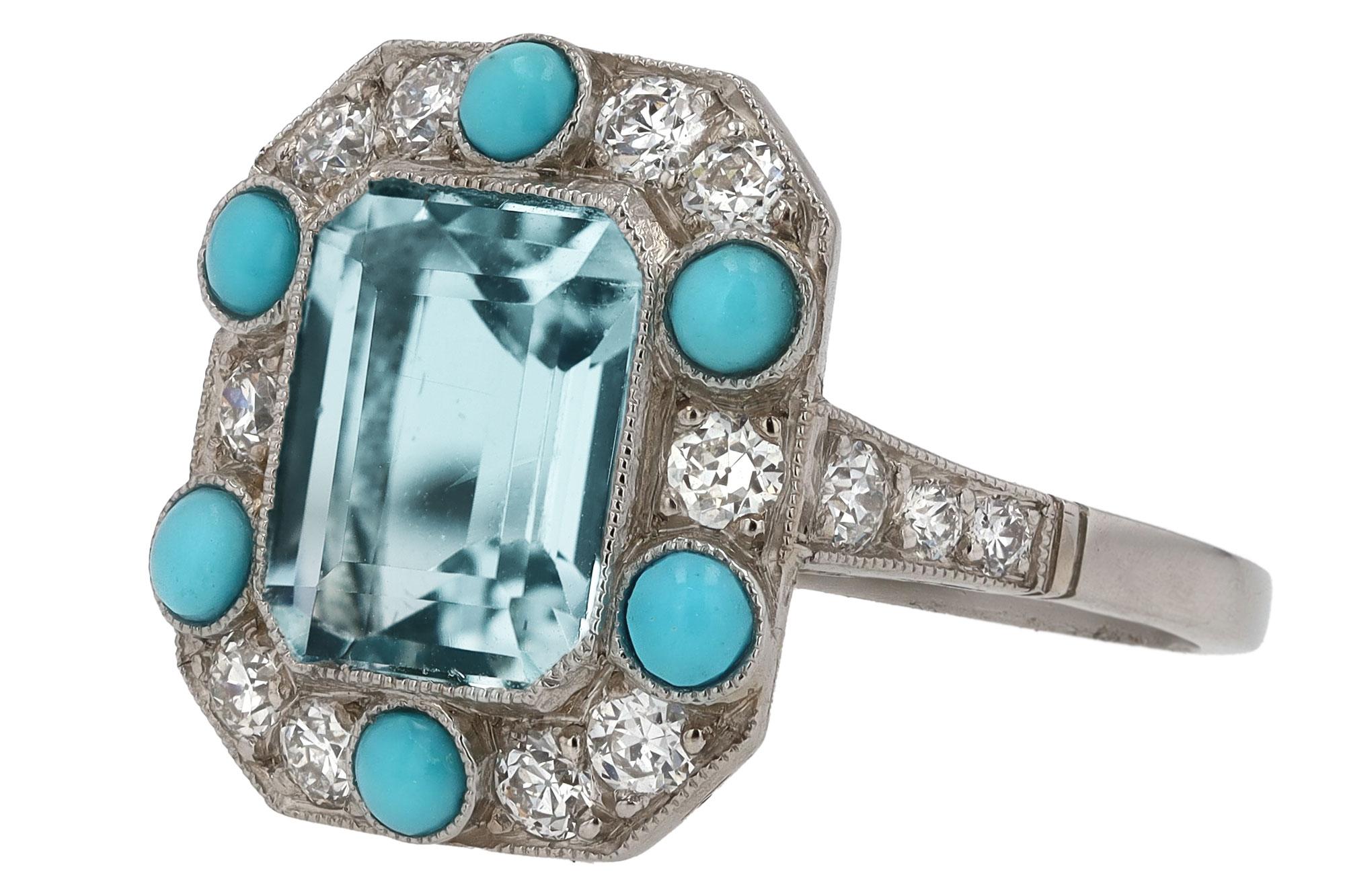 Fresh and lively describes the color combination of this Aquamarine gemstone engagement ring. Paired with Persian turquoise and diamonds, this hand fabricated platinum masterpiece is a faithful emulation of the Art Deco period loaded with great