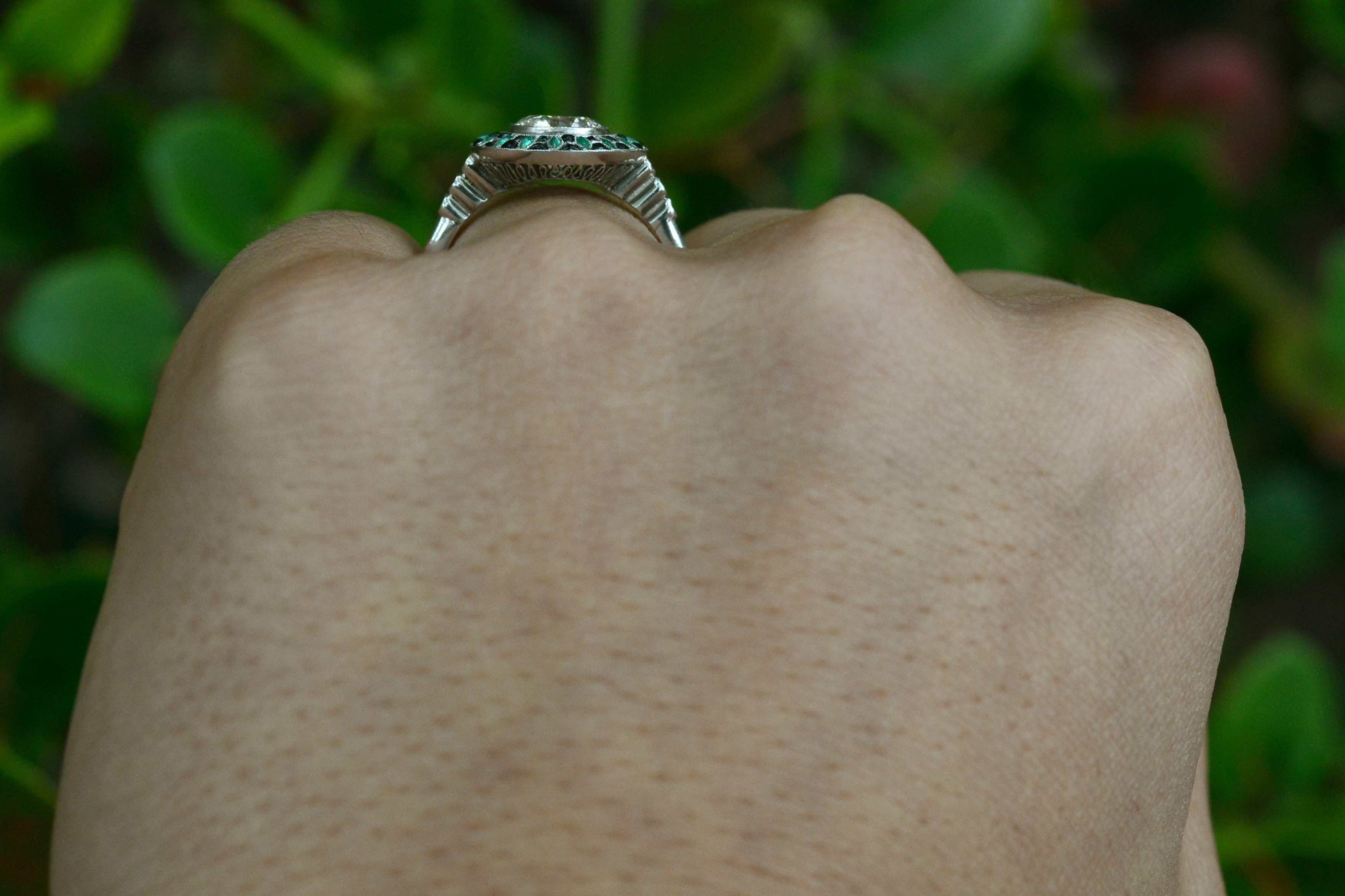 diamond and emerald engagement ring