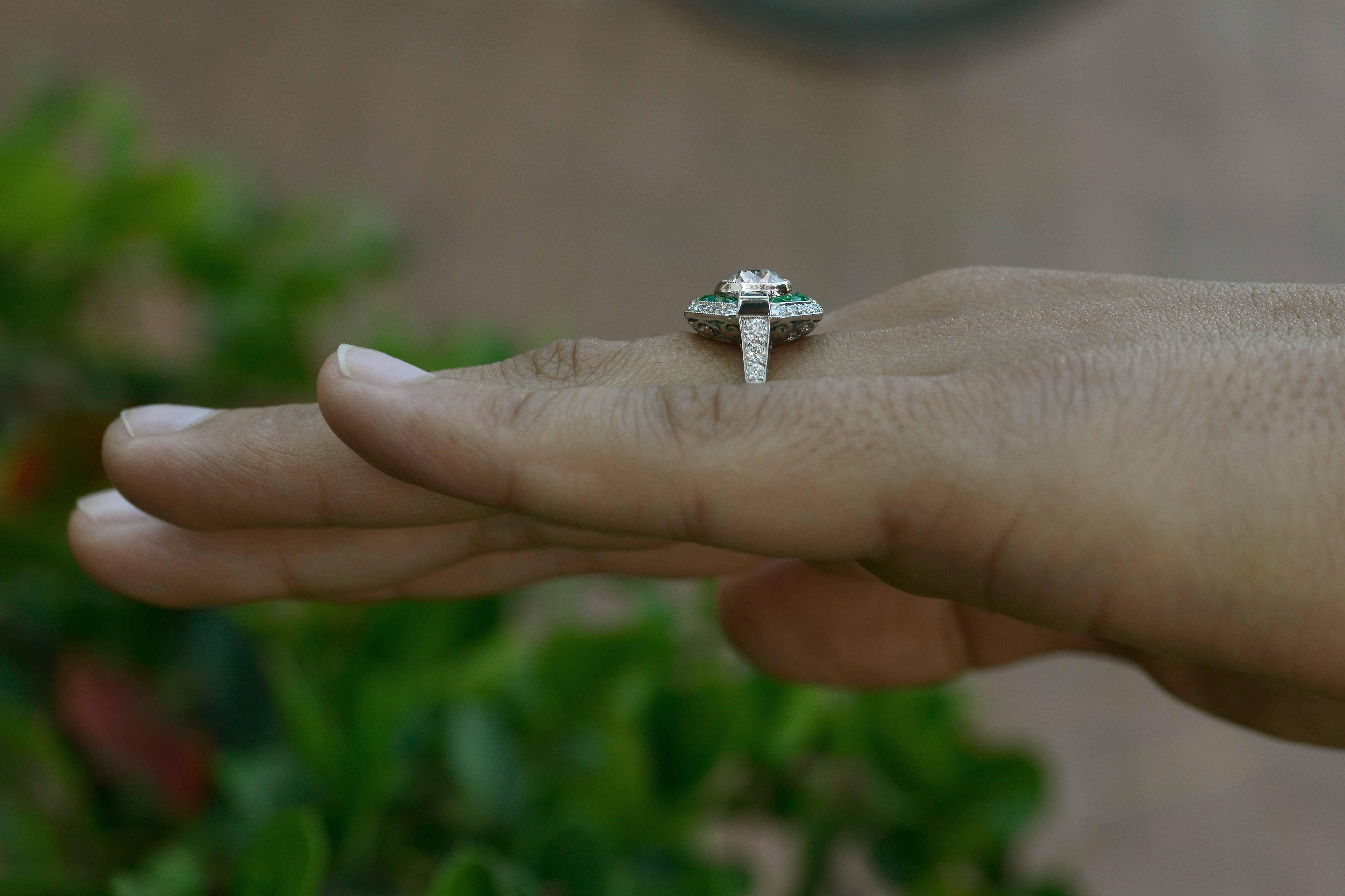 diamond ring with emerald halo