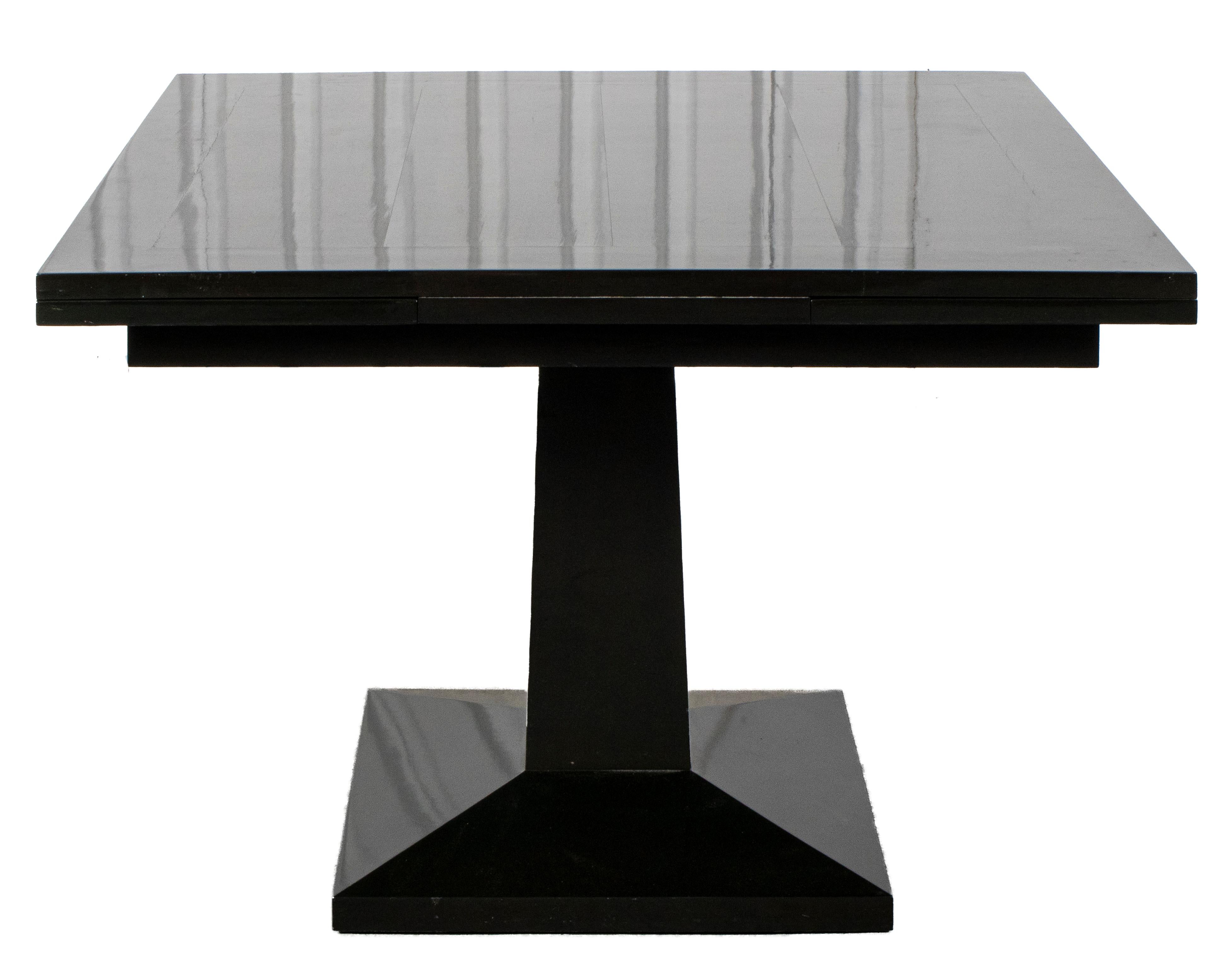Art Deco revival square dining table with extension leaves, on squared pedestal base.