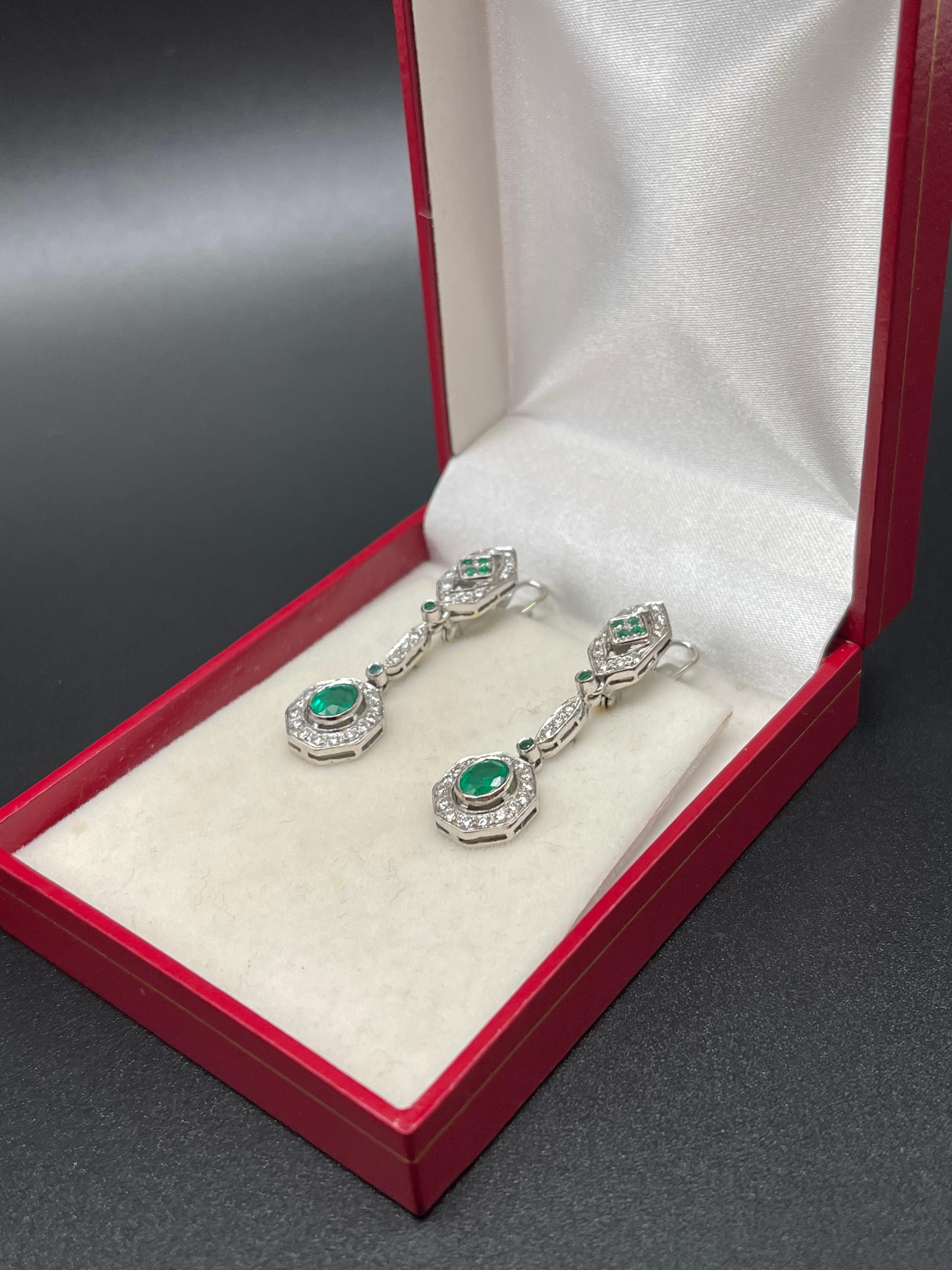 Oval Cut  Art Deco Emeralds and Diamonds White Gold Cocktail Earrings For Sale