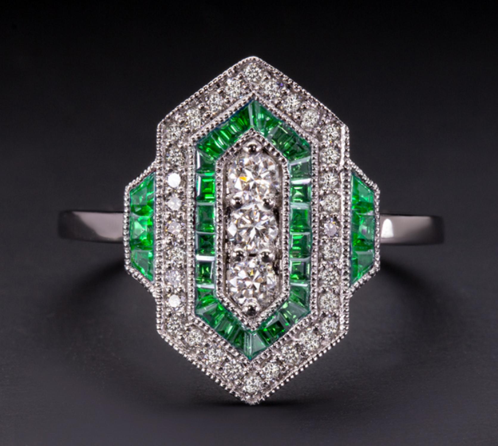Art deco style emerald diamond ring

The emeralds are cut and set with exceptional craftsmanship. Each emerald is individually cut to fit in the channel with zero gaps. This is a highly skilled and labor intensive process that truly makes this ring