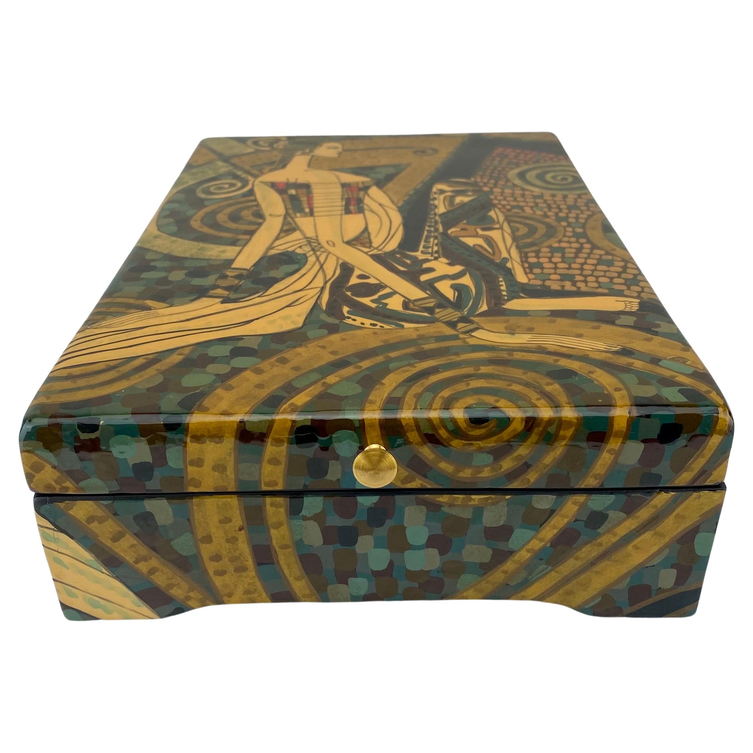 An exquisite Art Deco Revival style decorative storage or jewelry box. This unique piece showcases a figural representation of a woman standing beside a man, where the woman, in a dominant stance, captures attention with her larger-than-life
