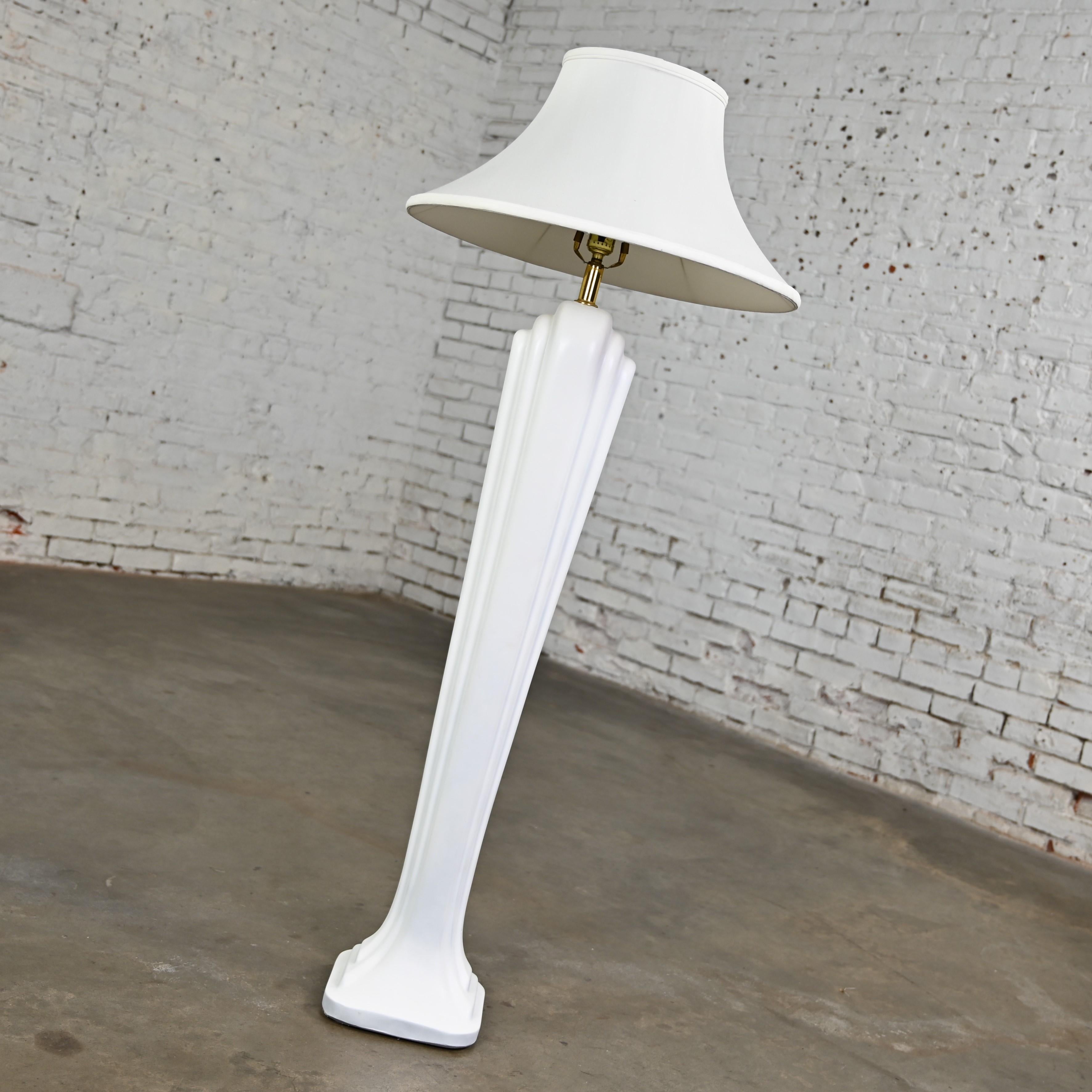 Gorgeous vintage Art Deco Revival to Postmodern Paolo Gucci floor lamp comprised of white sculpted resin and the original white silk-like bell shade. Beautiful condition, keeping in mind that this is vintage and not new so will have signs of use and