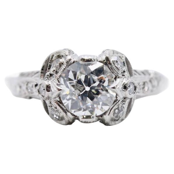 Art Deco Ribbon Motif 1.24ctw Diamond Engagement Ring in Platinum Circa 1920's For Sale