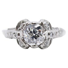 Antique Art Deco Ribbon Motif 1.24ctw Diamond Engagement Ring in Platinum Circa 1920's