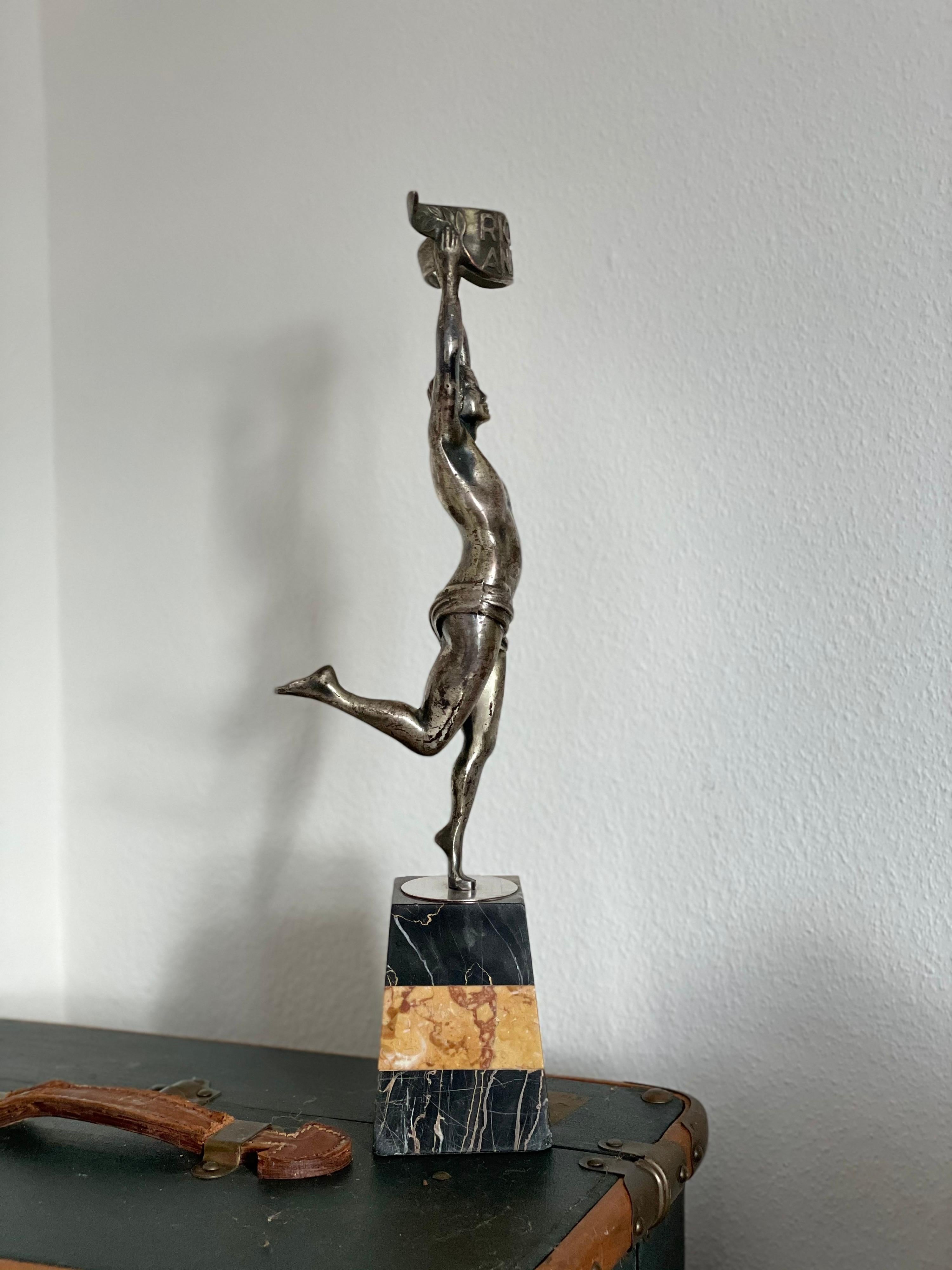 Art Deco sculpture made in France, issued by the famous company RICARD. An authentic piece standing on a marble base.