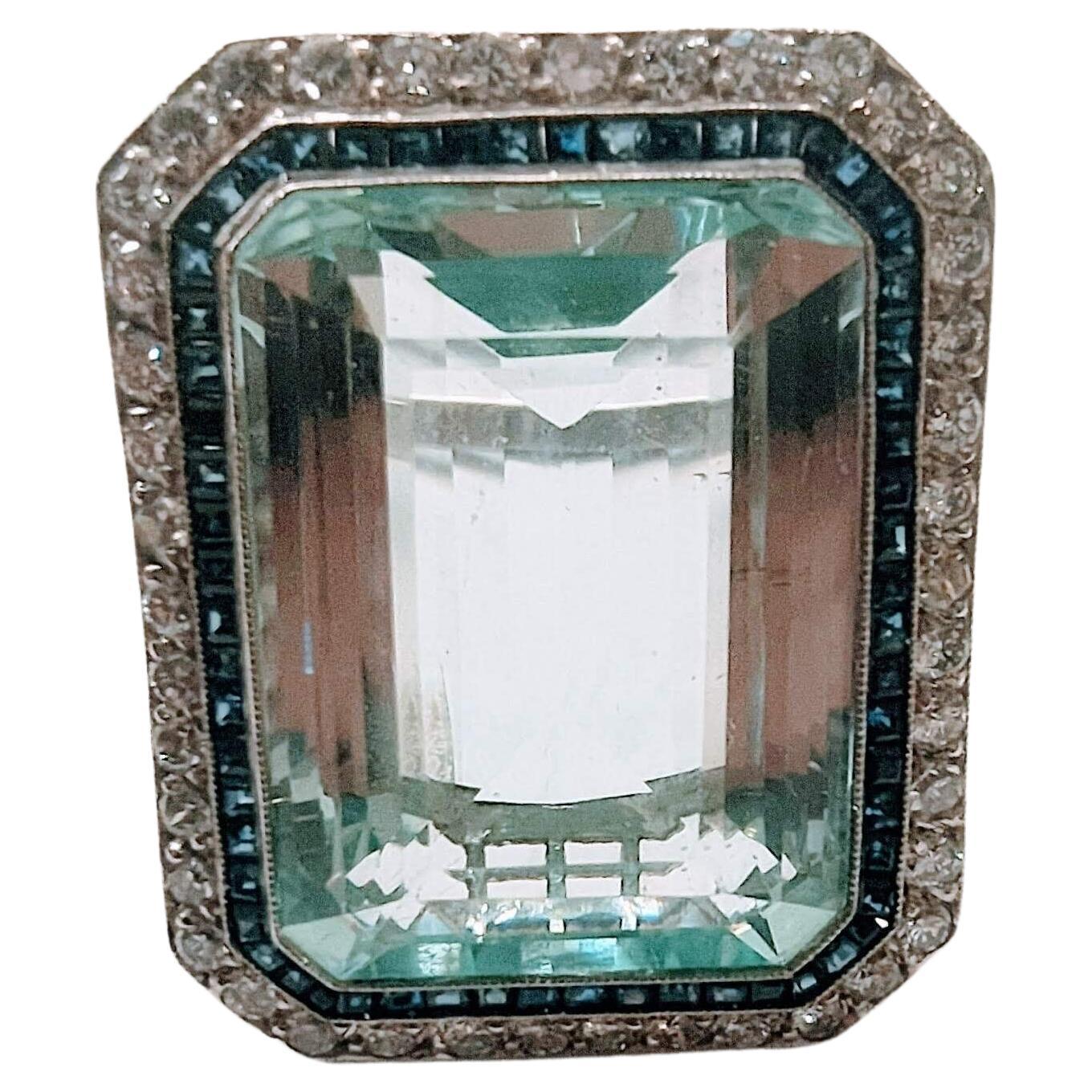 Emerald Cut Vintage Art Deco Ring Aquamarine 30 Ctw. Diamond and Sapphire Platinum For Sale