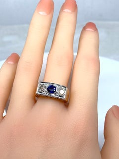 Art Deco ring in 18 carat gold adorned with a sapphire and diamonds, 1930 period