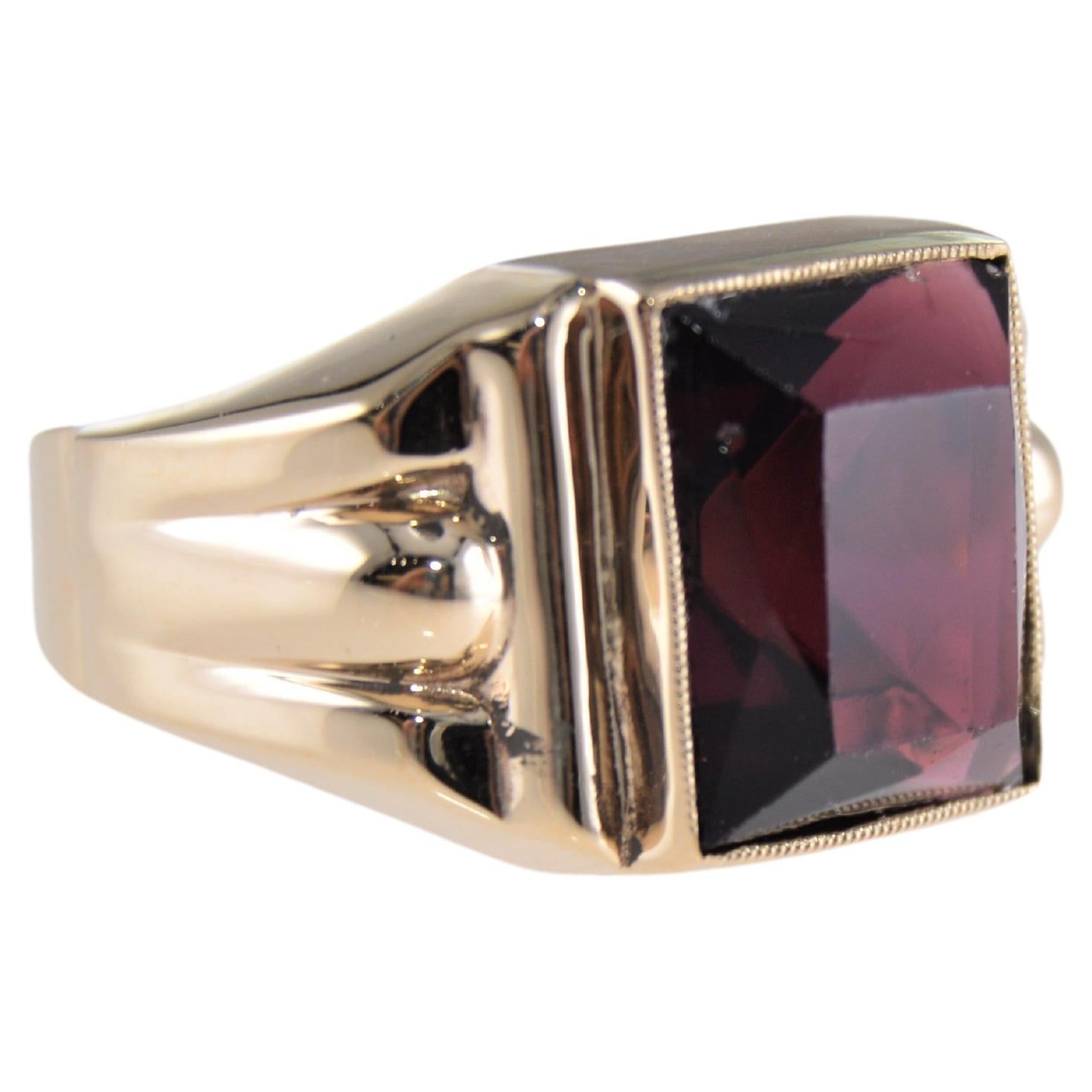 STYLE / REFERENCE: Art Deco
METAL / MATERIAL: 10Kt. Solid Gold
CIRCA / YEAR: 1940's
STONE: Synthetic Ruby
SIZE: 9

This unique hand made ring is set with a synthetic ruby and done in the Art Deco Style. The workmanship is excellent and the ring is
