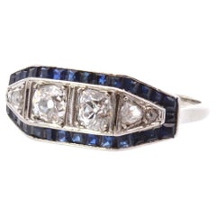 Art déco ring with diamonds and calibrated sapphires