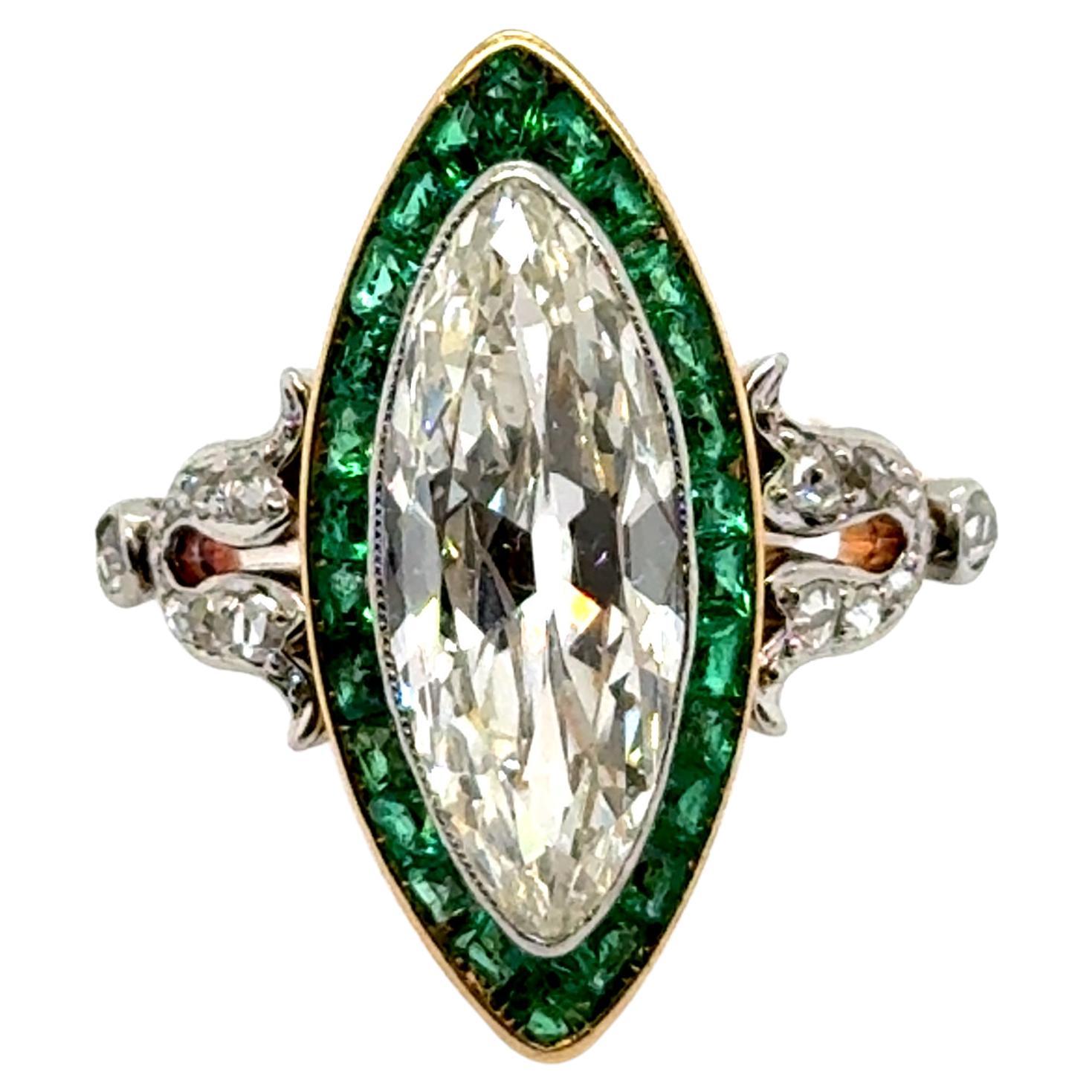 Art-Déco-Ring aus 18 Karat Gelbgold und Platin mit Diamanten und Smaragden
