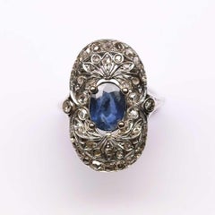 Art Deco Ring With Oval Sapphire and Diamonds