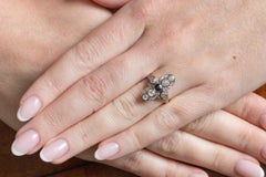 Art Deco Ring with Round Sapphire and Diamonds 0.70 ct.