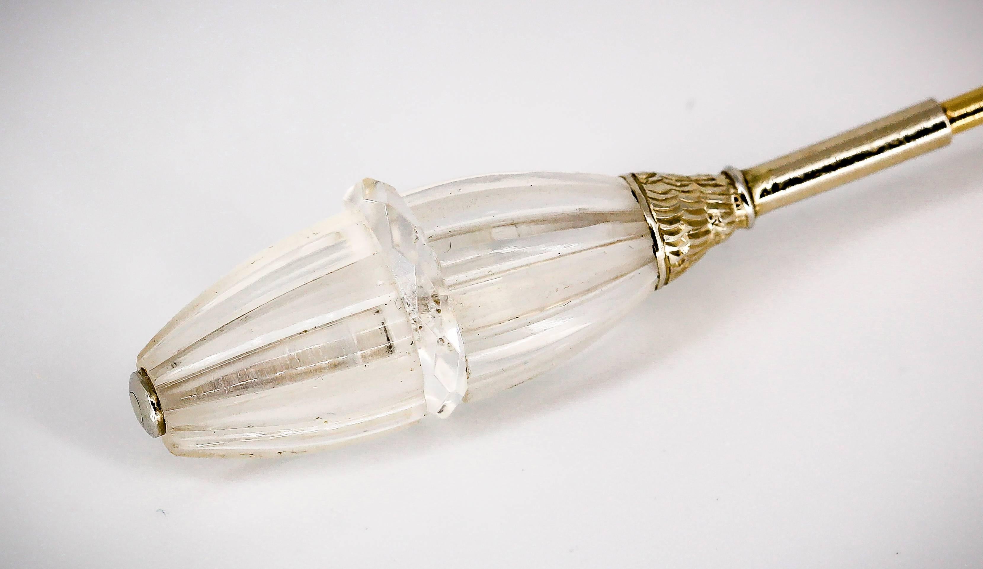 Rare and unusual rock crystal and platinum and 14K gold jabot pin, circa 1920. Excellent workmanship and easy to wear. One side unscrews for ease of installation. One side has a chip on rock crystal as seen in picture no. 5.

