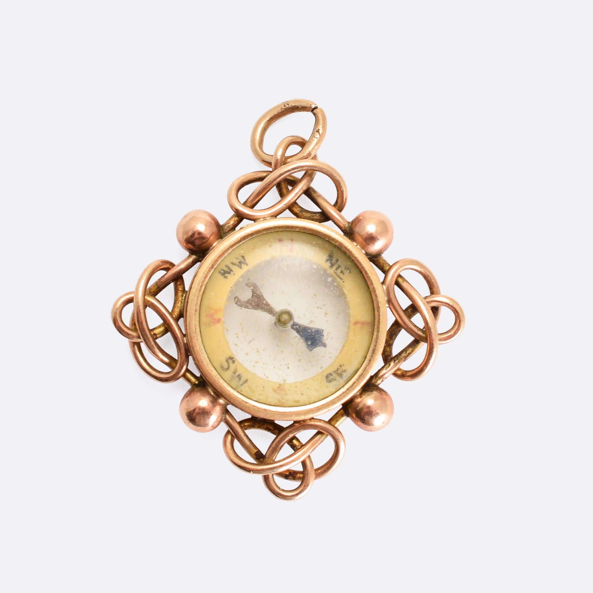 A fine vintage working compass pendant crafted in 9k rose gold. It's a larger scale example, with an infinity knot and pommel border. If you've lost your way, this is sure to help.

MEASUREMENTS 
3.1 x 3.0cm

WEIGHT 
6.8g

MARKS 
English hallmarks