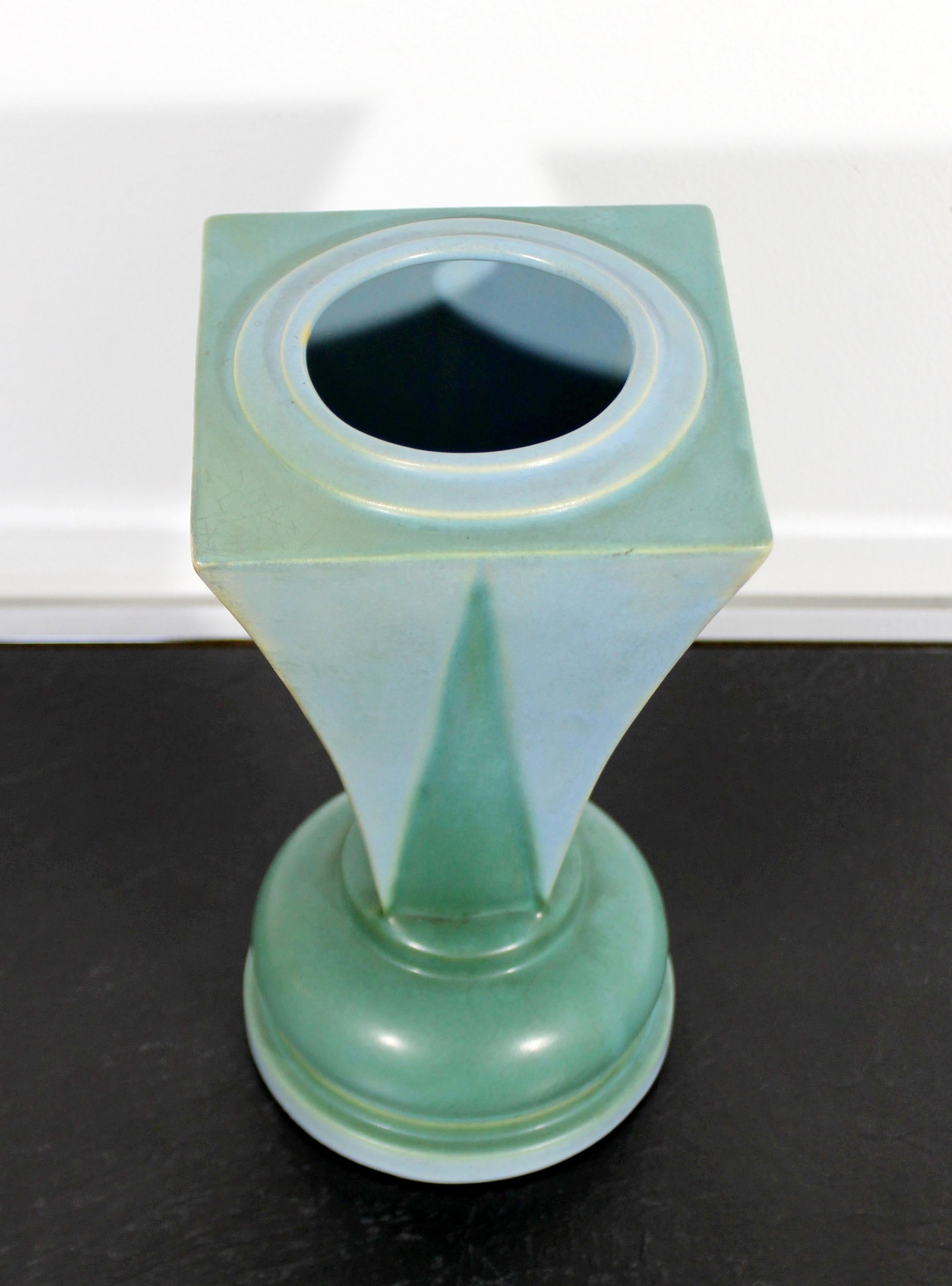 For your consideration is an incredible, ceramic, shooting star shaped art vase or vessel, made by Roseville Futura, circa 1930s. In excellent condition. The dimensions are 5