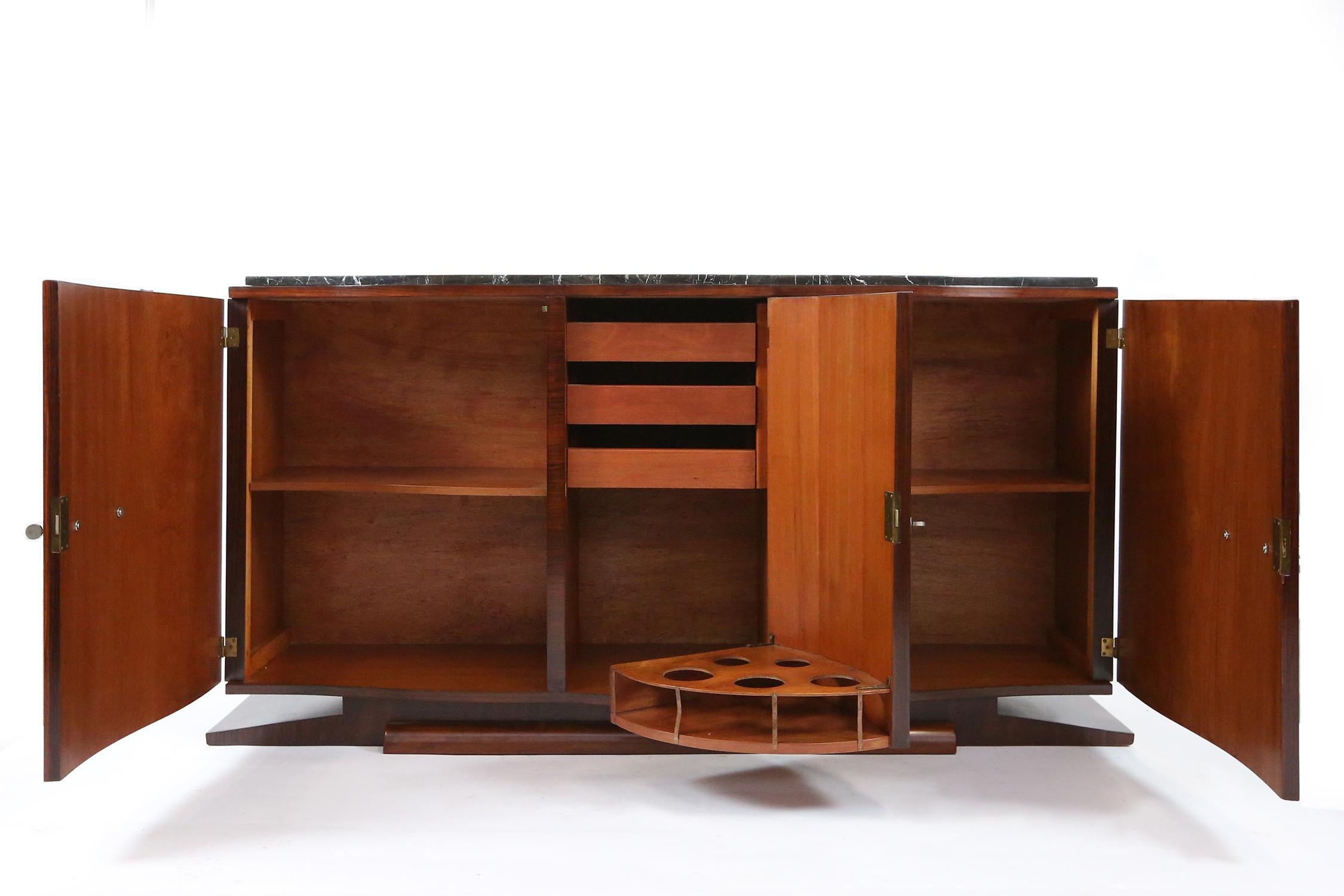 Art-deco sideboard, credenza from 1930, Belgian origin from Atelier De Coene et Frères. Walnut veneer and silver plated keys and handles with a Belgian black marble top. Completely restored with a hand made French polish.