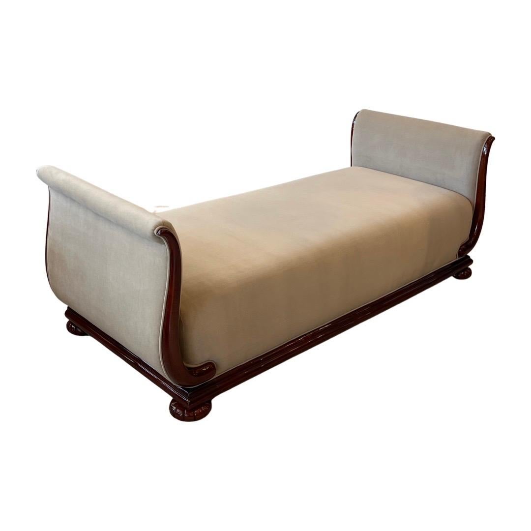 This Daybed with sleek lines and geometric shapes was designed in France by Jules Leleu.  It is made out of Rosewood and upholstered in a Taupe color silk velvet.
Daybeds are a type of furniture that were very popular in the Art Deco period, which