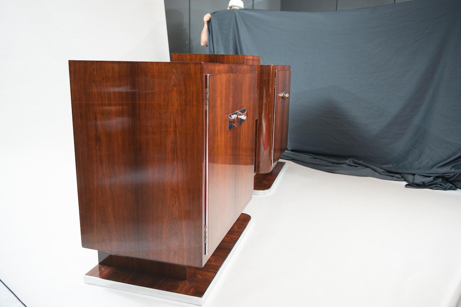 Rosewood Art Deco sideboard, with a chrome frame in the base and chrome plates on the doors.