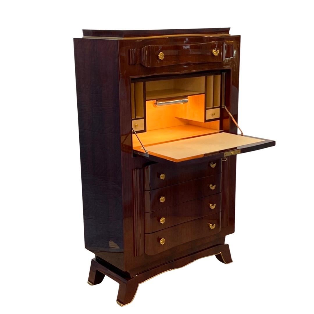 A Rosewood marquetry Secretaire with Mother of Pearl and Ebony inlays depicting blossoming  small wild flowers branches and butterflies on the front door.  This piece has 5 drawers that are lined with Off-White leather and Bronze knobs.  The cabinet