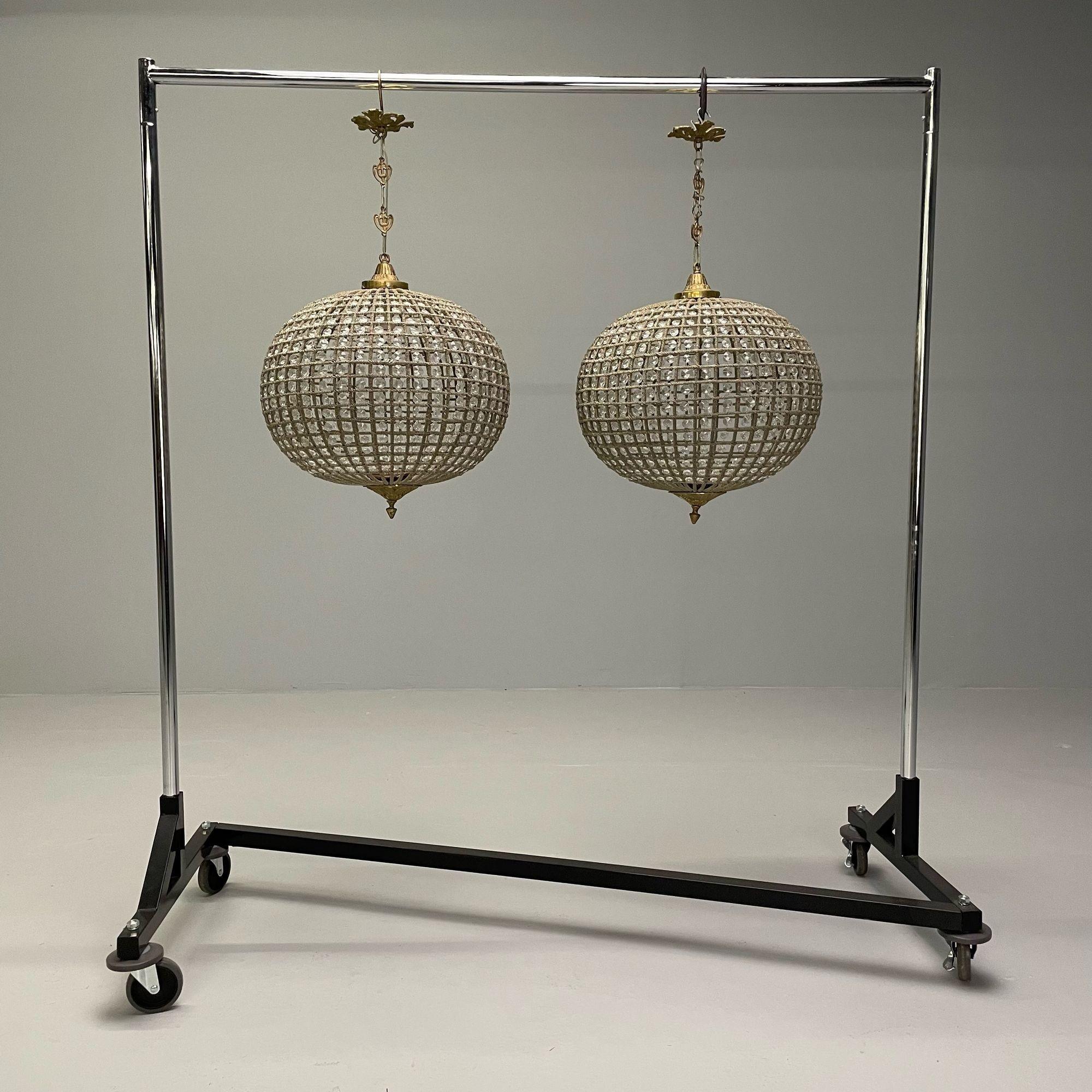 Art Deco, Round Chandeliers, Beveled Crystal, Metal, American, 1980s
A detailed pair of circular globe mesh wired and crystal lights. Exquisite pendant chandeliers, each in round shape wired with crystals. Each having a 11