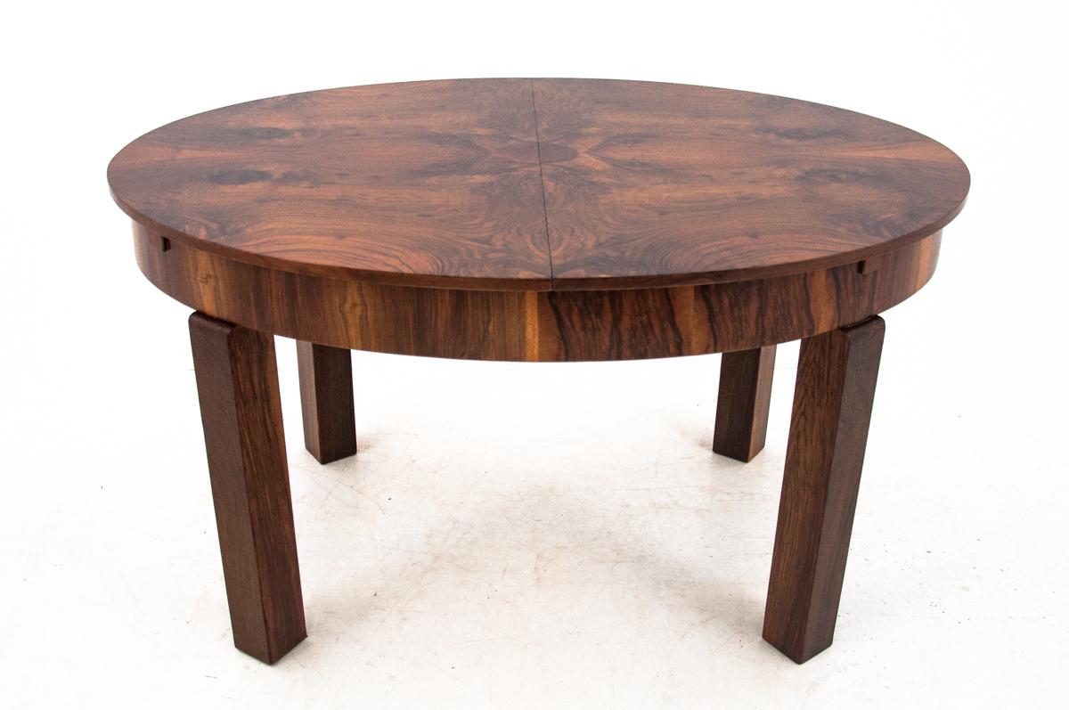 Walnut Art Deco dining table. After renovation
Comes from Poland from circa 1940s-1950s.
Beautiful unique walnut veneer.
Measures: 197 cm after unfolding.


   