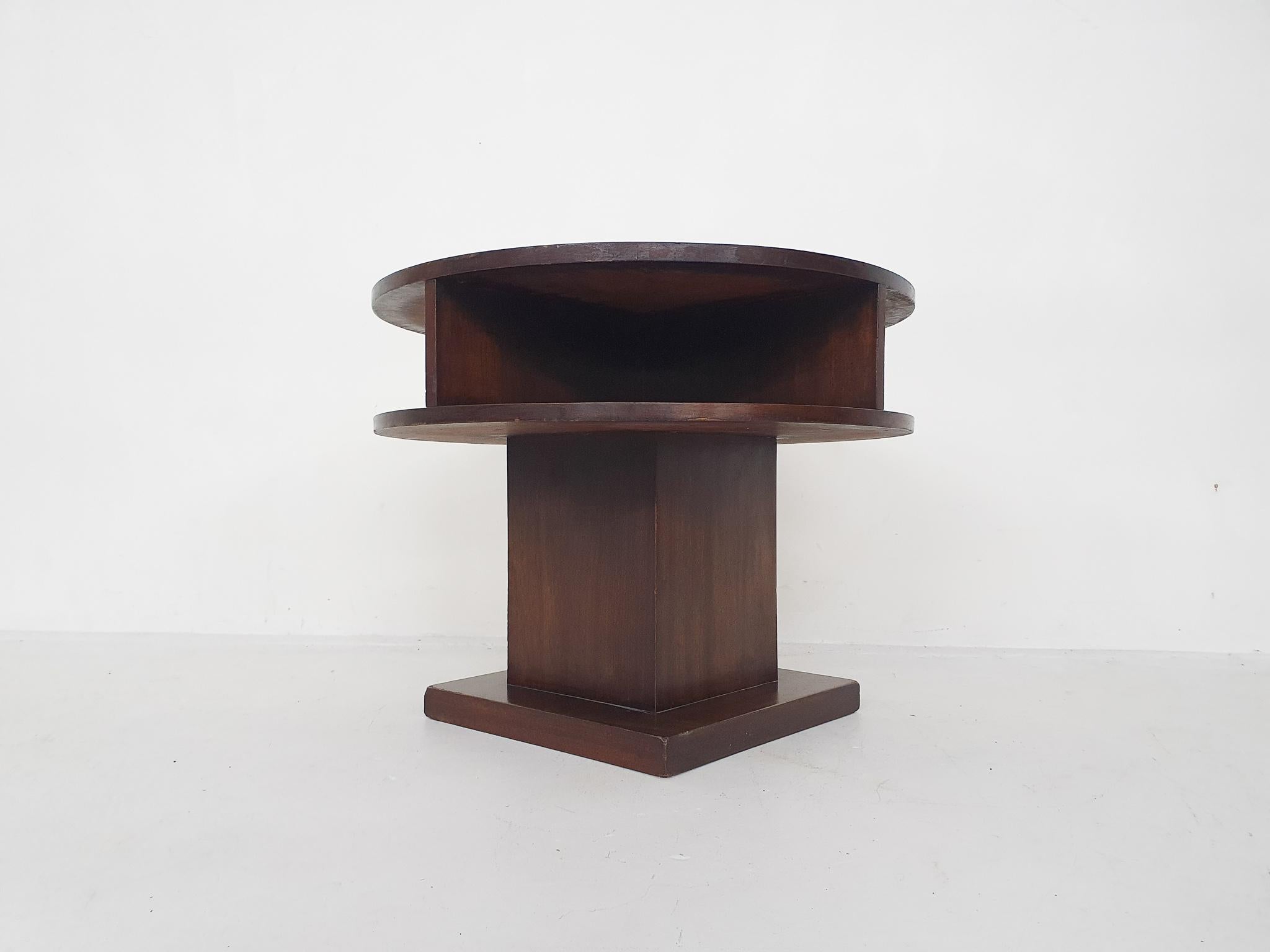 Mahogany wooden side table with storage space. In good original condition.
