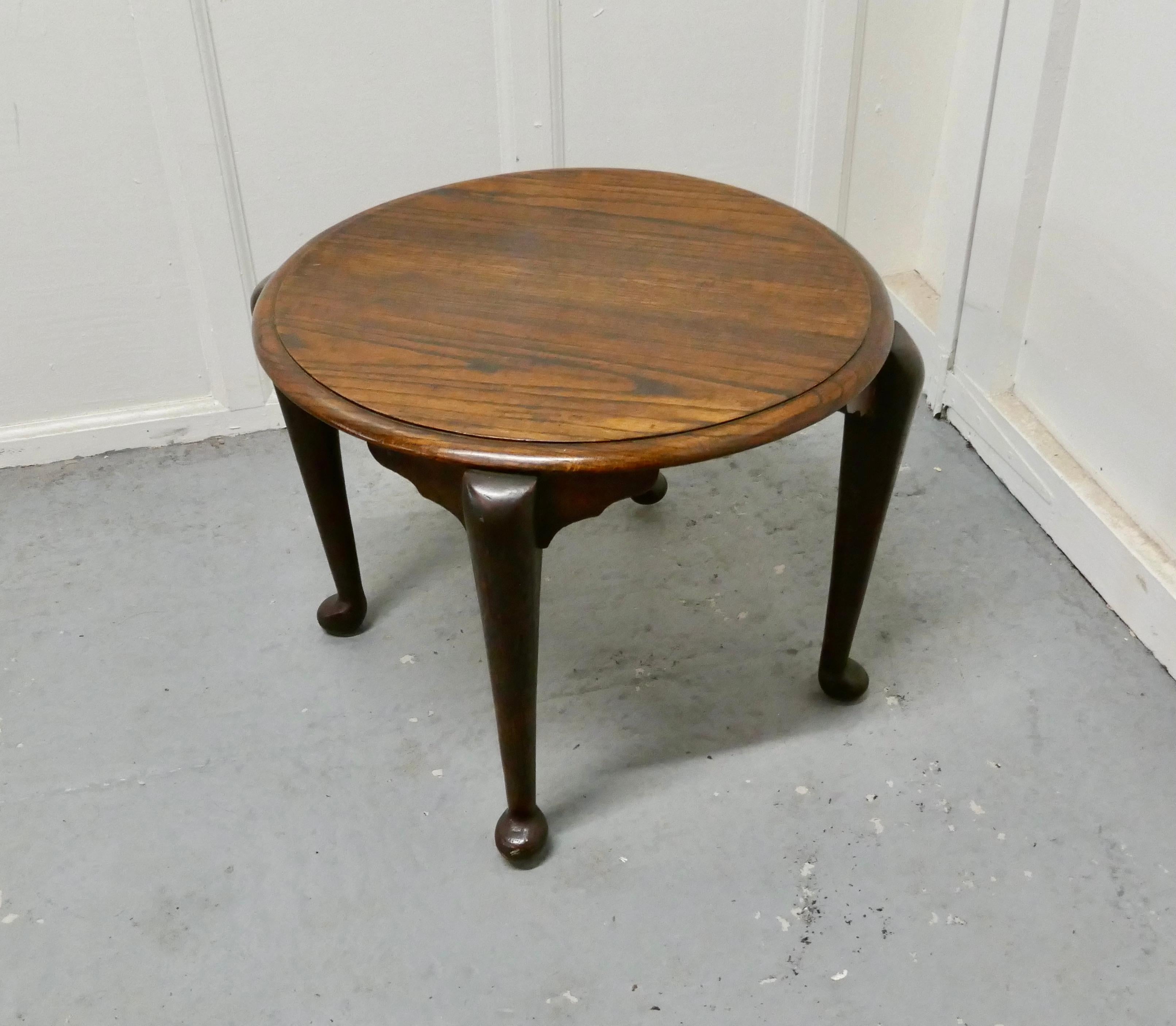 Art Deco round oak coffee table

A stylish piece from the 1920s
A superb oak coffee table with pad foot cabriole legs in the odeon style
The Classic design of this piece is unmistakably 1920s 
The construction of the table is solid oak it is in